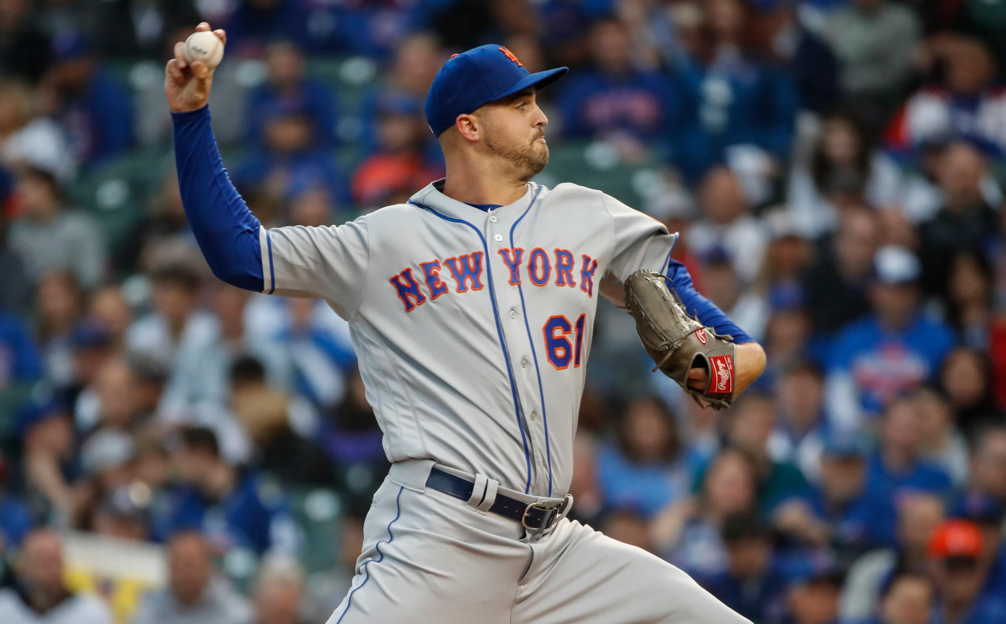 Jun 20, 2019; Chicago, IL, USA; New York Mets starting pitcher Walker Lockett (61) delivers against the Chicago Cubs during the first inning at Wrigley Field. Mandatory Credit: Kamil Krzaczynski-USA TODAY Sports / Kamil Krzaczynski