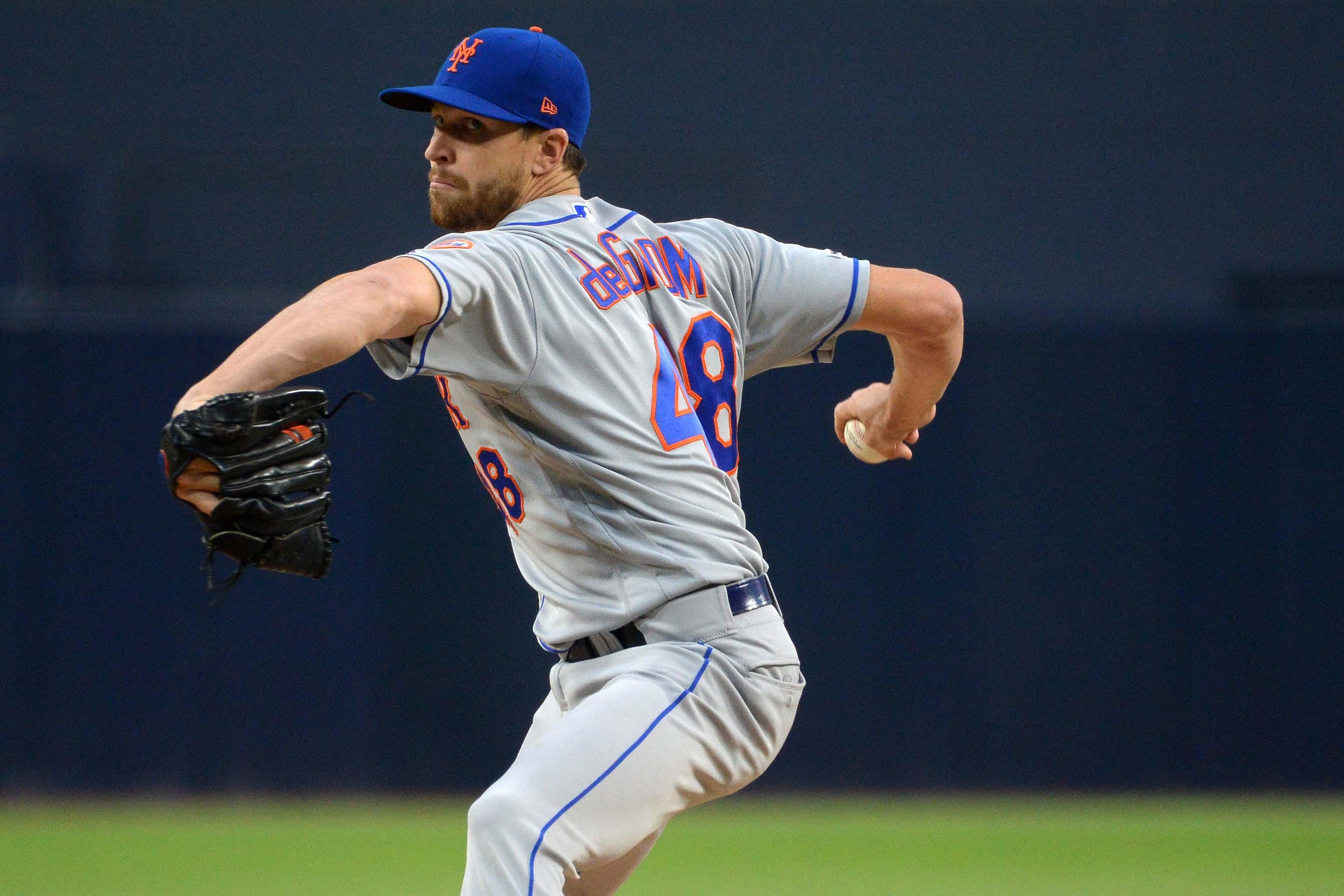 New York Mets starting pitcher Jacob deGrom pitches during the first inning against the San Diego Padres at Petco Park. / Jake Roth/USA TODAY Sports