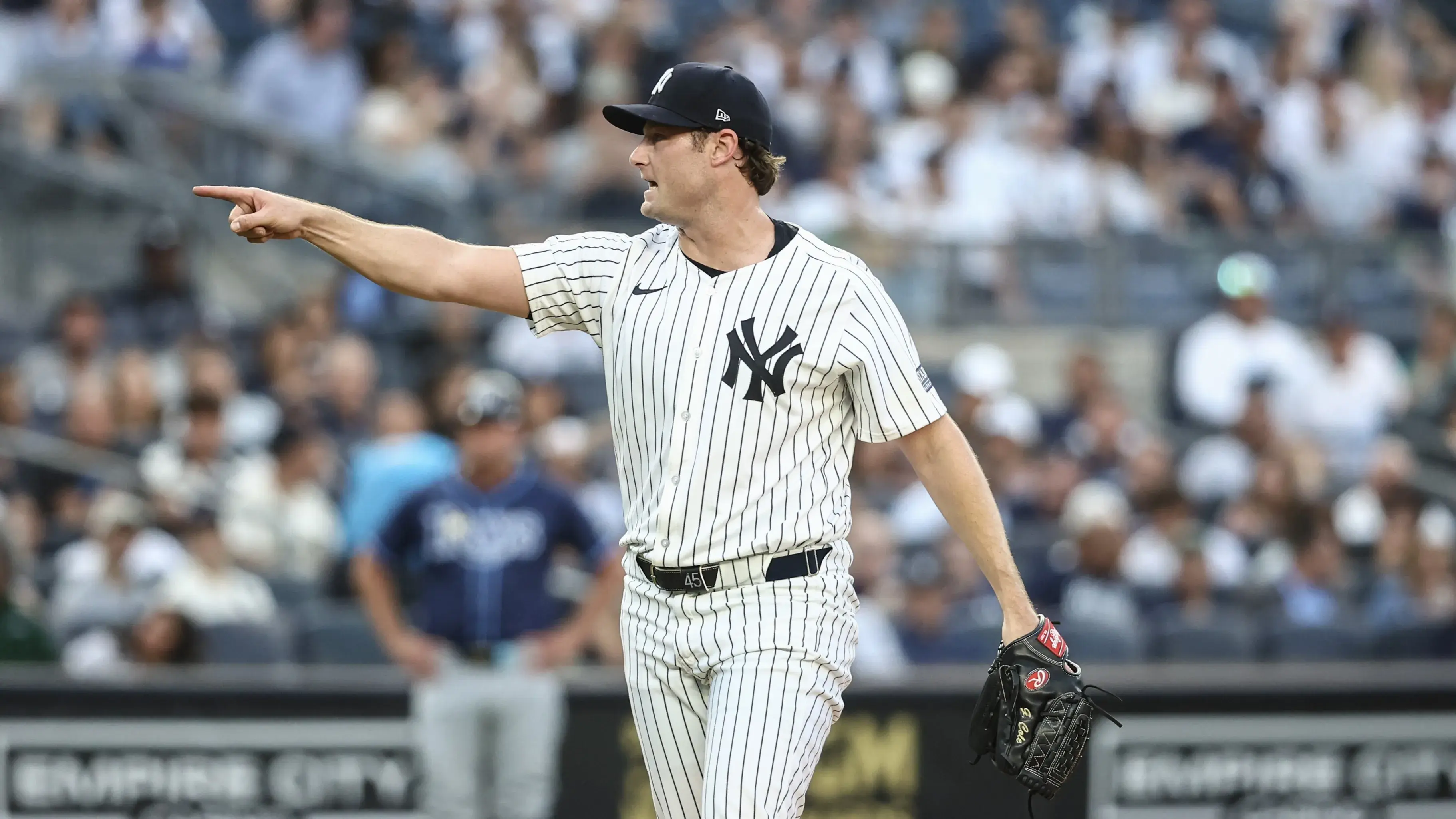 Jul 19, 2024; Bronx, New York, USA; New York Yankees starting pitcher Gerrit Cole (45) reacts after retiring the side in the second inning against the Tampa Bay Rays at Yankee Stadium. Mandatory Credit: Wendell Cruz-Imagn Images / © Wendell Cruz-Imagn Images