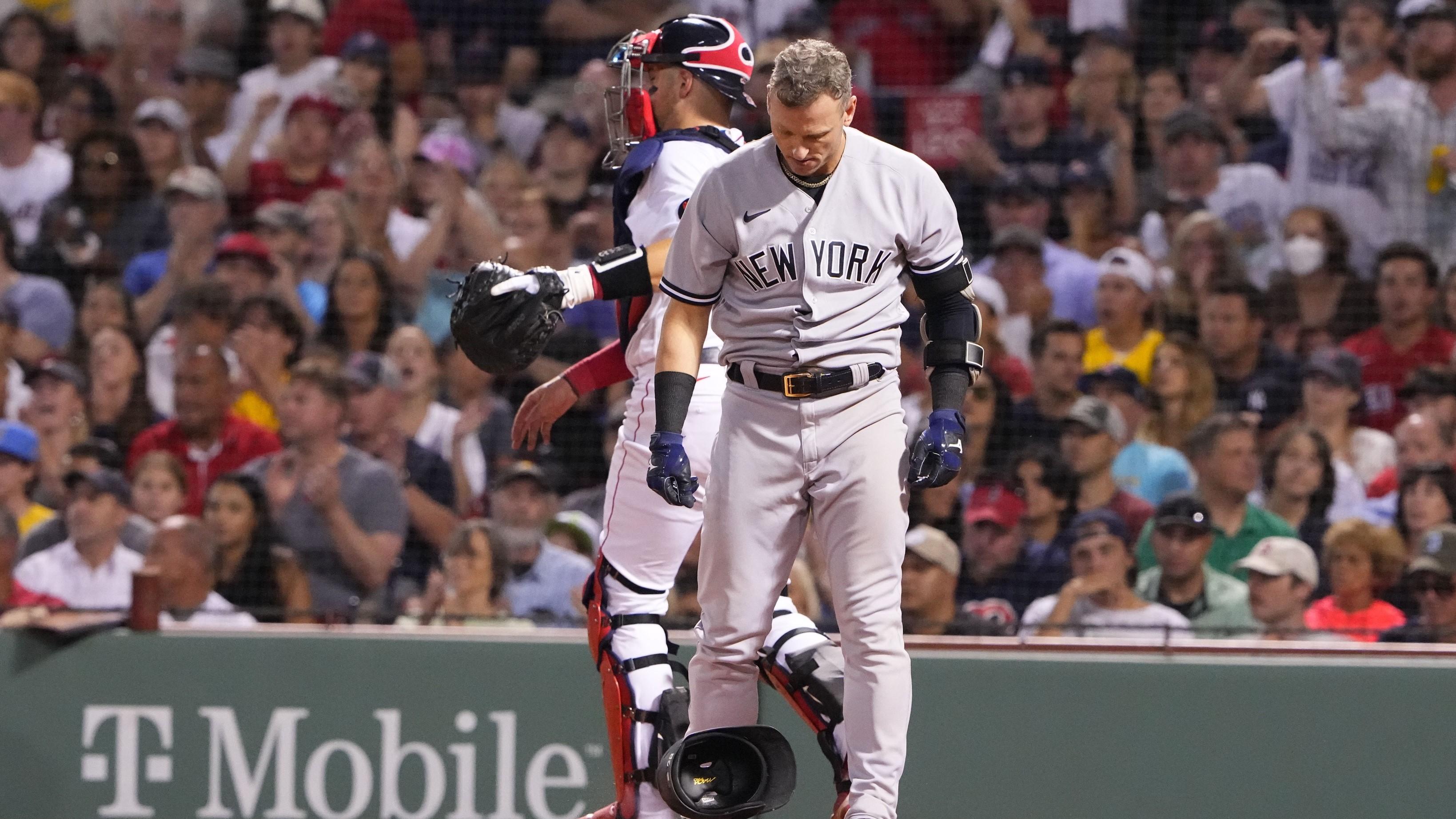 Aug 14, 2022; Boston, Massachusetts, USA; New York Yankees third baseman Josh Donaldson (28) reacts to striking out by throwing his Helmut during the sixth inning against the Boston Red Sox at Fenway Park.