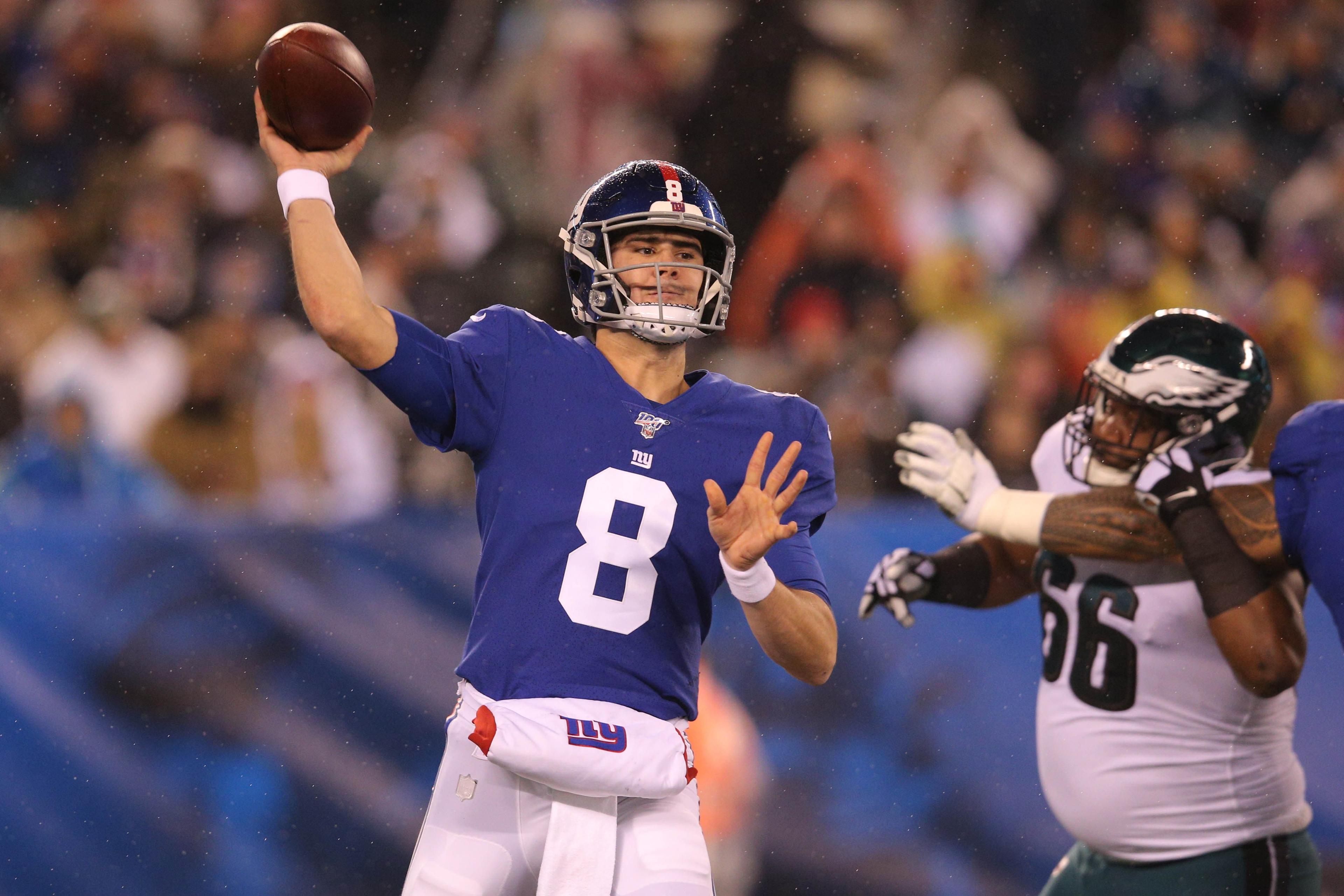 Dec 29, 2019; East Rutherford, New Jersey, USA; New York Giants quarterback Daniel Jones (8) throws a pass against the Philadelphia Eagles during the first quarter at MetLife Stadium. Mandatory Credit: Brad Penner-USA TODAY Sports / Brad Penner