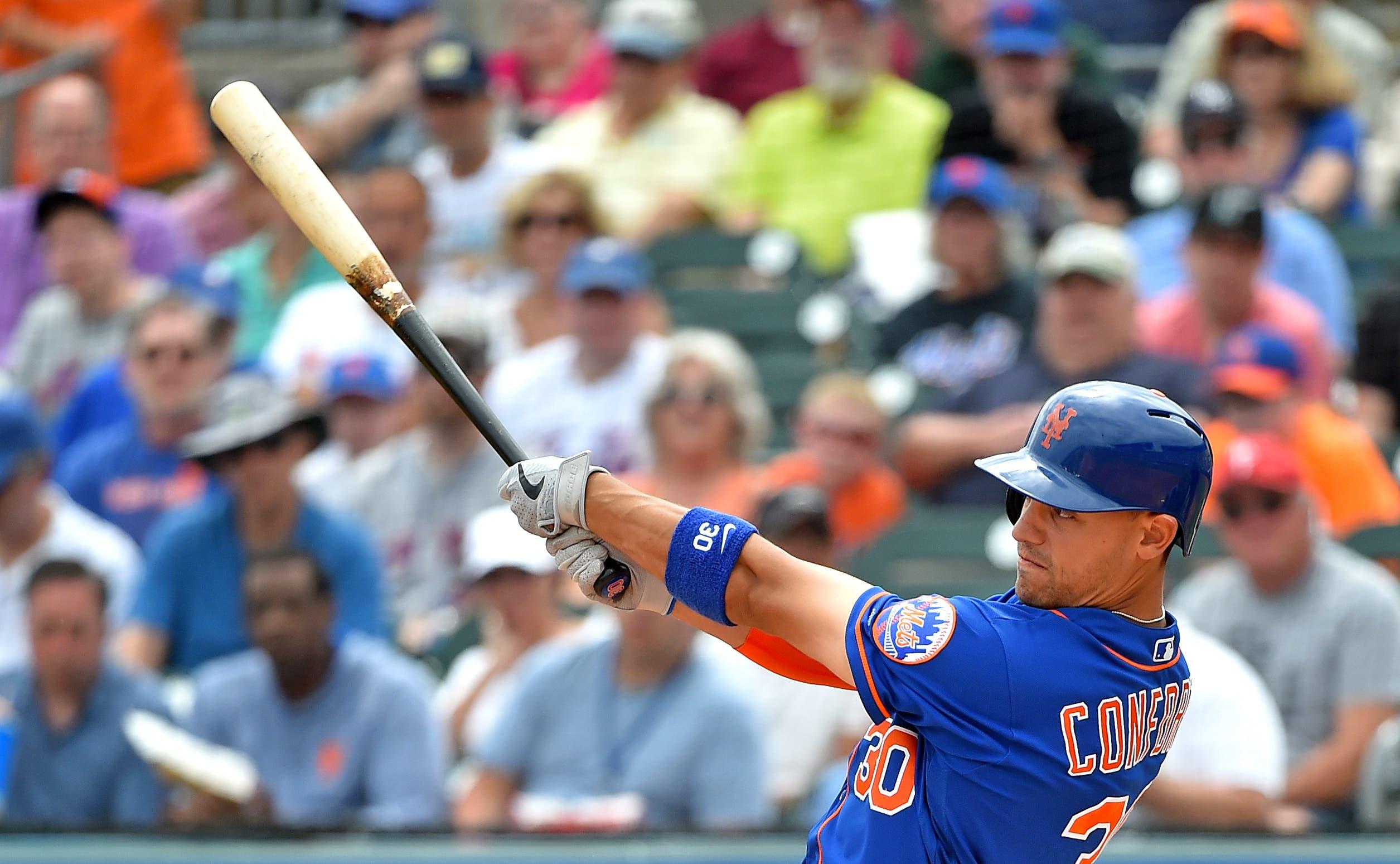 New York Mets left fielder Michael Conforto connects for a two-run homer against the Miami Marlins during a spring training game at Roger Dean Chevrolet Stadium. / Steve Mitchell/USA TODAY Sports