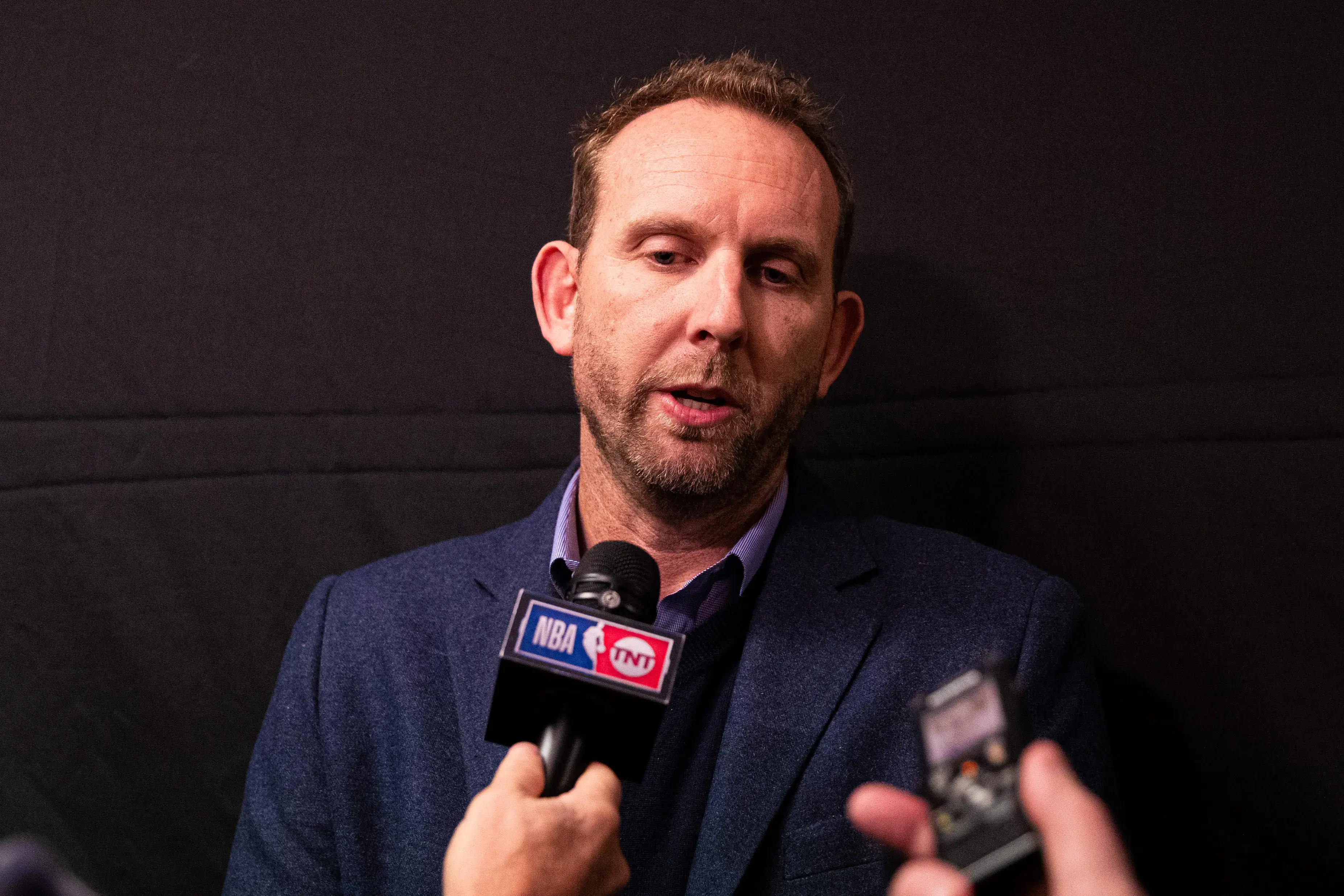 Feb 20, 2020; Philadelphia, Pennsylvania, USA; Brooklyn Nets general manager Sean Marks speaks with the media about the injury status of Kyrie Irving (not pictured) before a game against the Philadelphia 76ers at Wells Fargo Center. / Bill Streicher-USA TODAY Sports