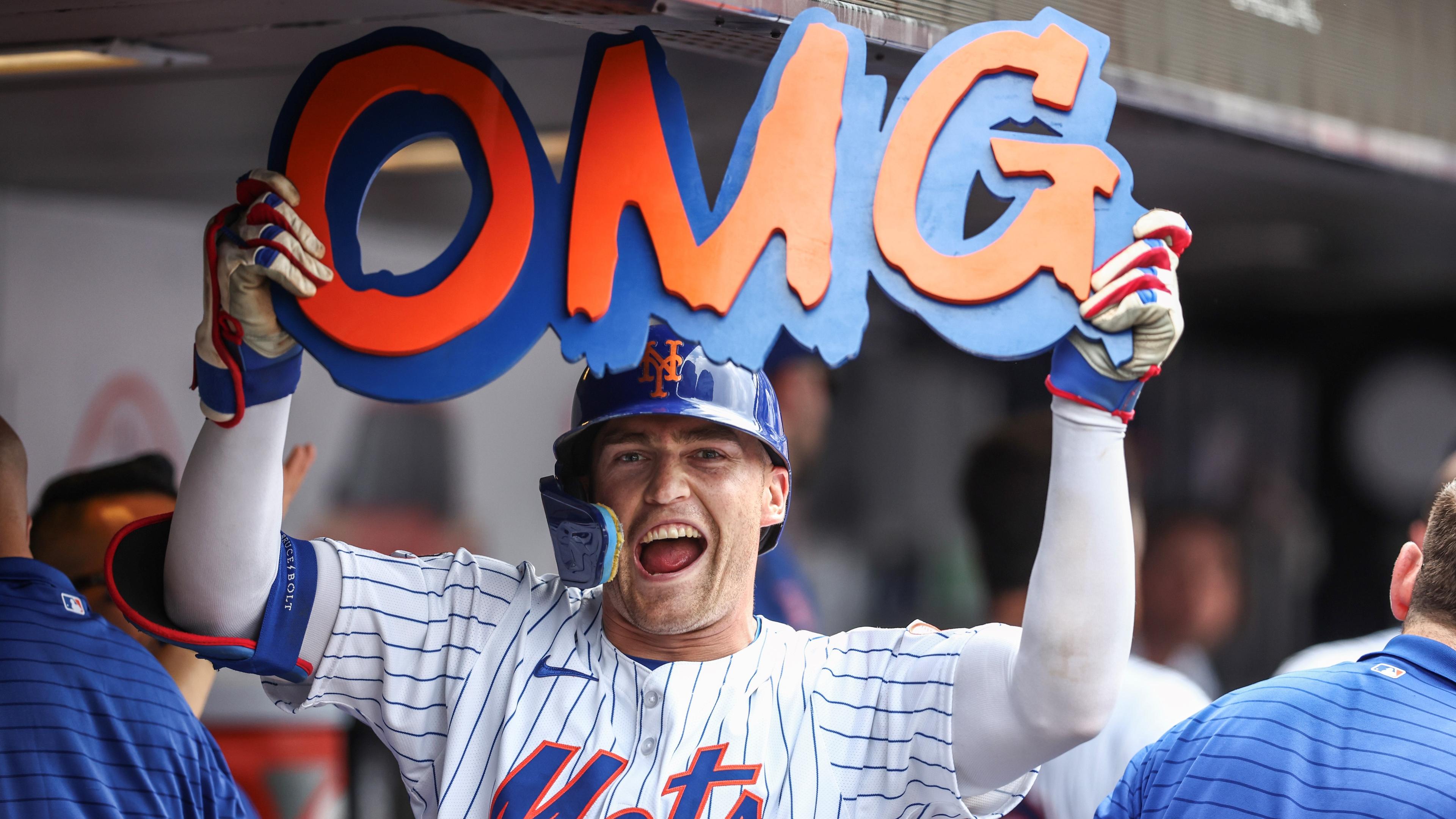 Jun 30, 2024; New York City, New York, USA; New York Mets center fielder Brandon Nimmo (9) celebrates in the dugout after hitting a two run home run to tie the game in the seventh inning against the Houston Astros at Citi Field. Mandatory Credit: Wendell Cruz-USA TODAY Sports / © Wendell Cruz-USA TODAY Sports