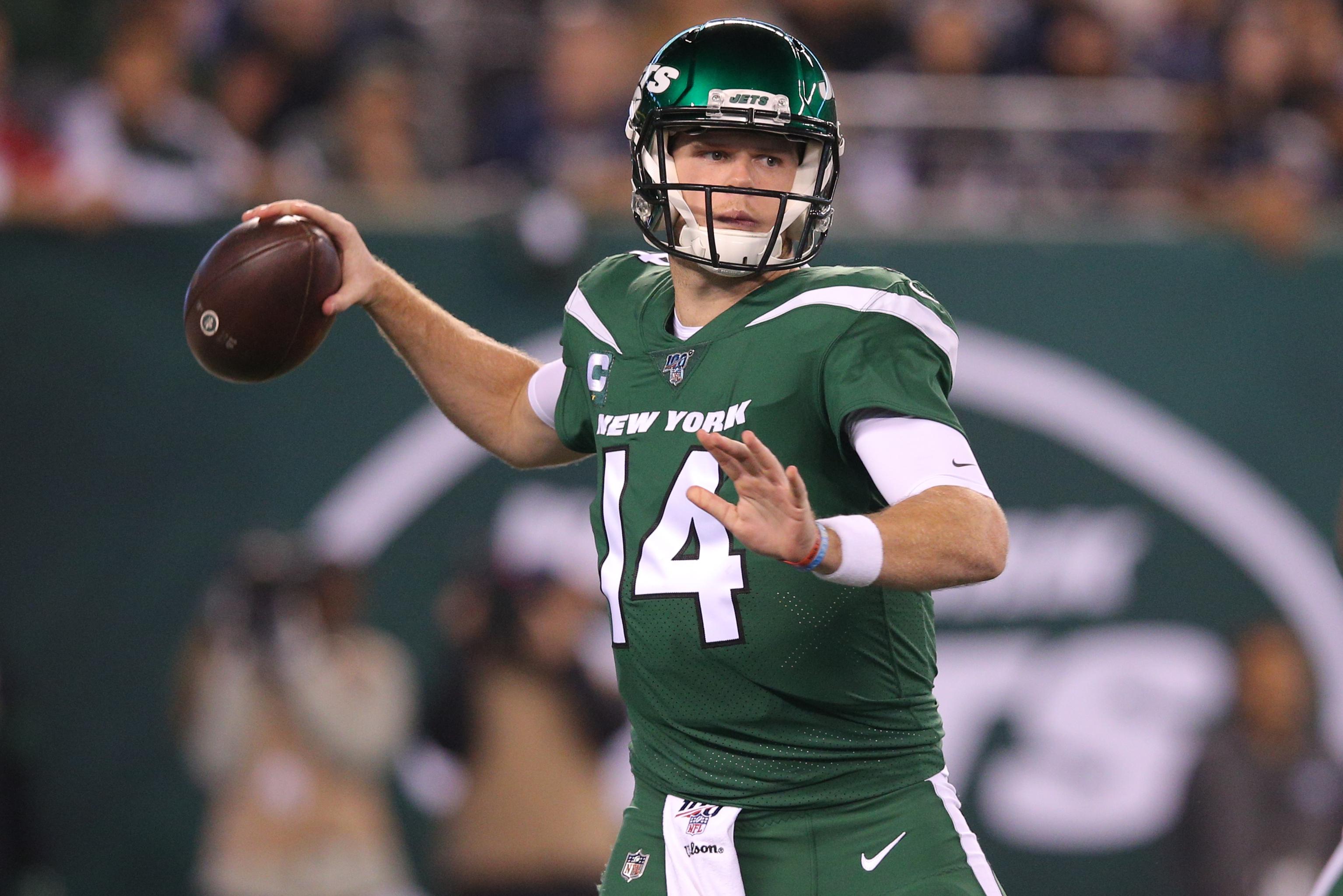 Oct 21, 2019; East Rutherford, NJ, USA; New York Jets quarterback Sam Darnold (14) throws a pass against the New England Patriots during the first quarter at MetLife Stadium. Mandatory Credit: Brad Penner-USA TODAY Sports