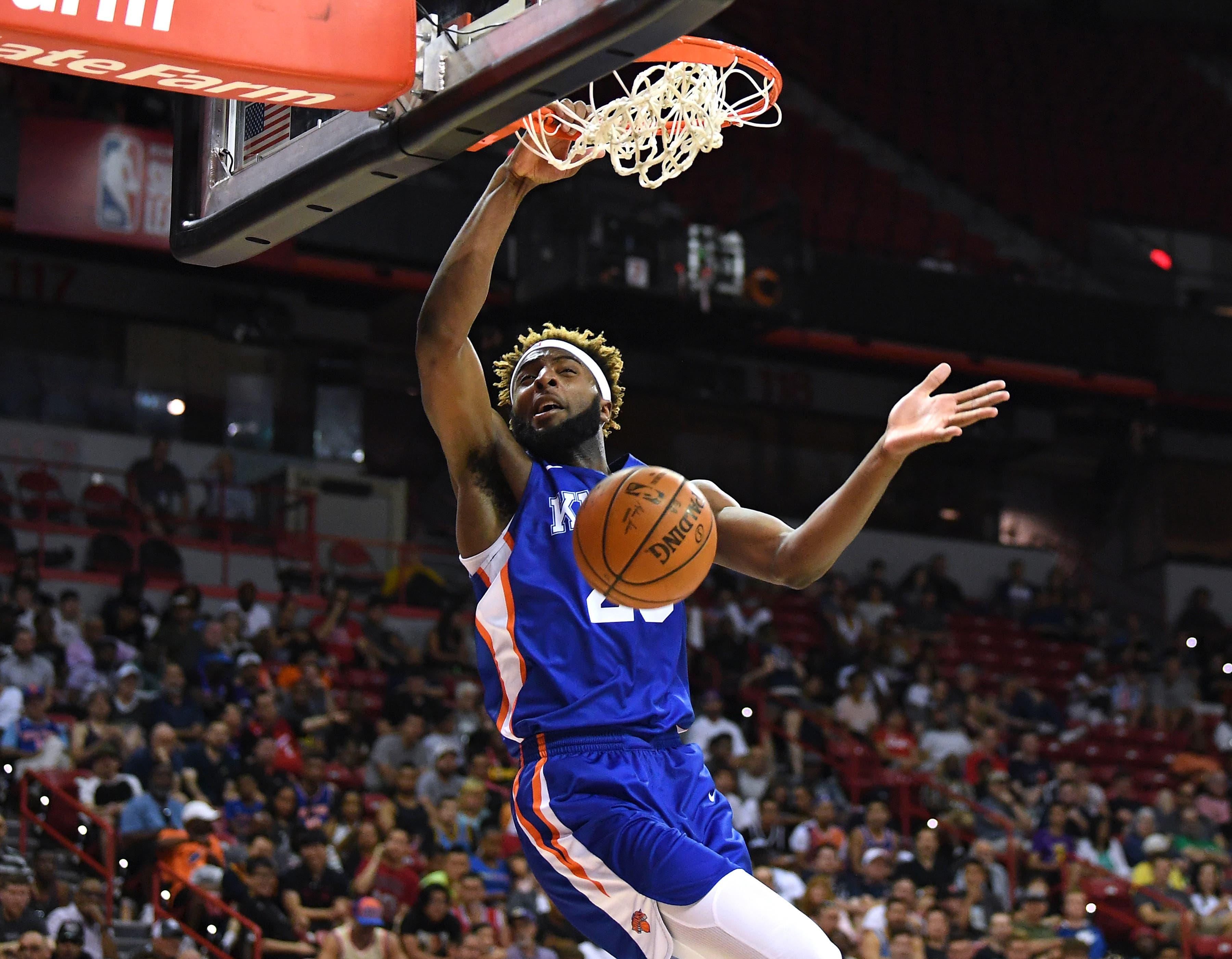 Jul 7, 2019; Las Vegas, NV, USA; New York Knicks center Mitchell Robinson (23) dunks during the second half of an NBA Summer League game against the Phoenix Suns at Thomas & Mack Center. Mandatory Credit: Stephen R. Sylvanie-USA TODAY Sports / Stephen R. Sylvanie