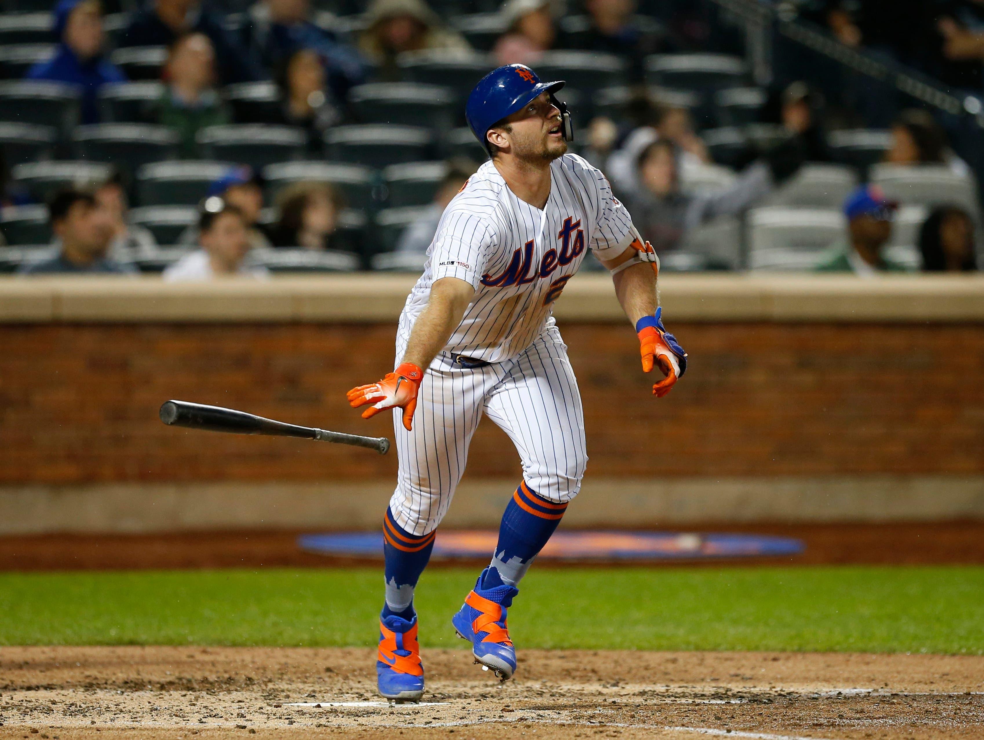 May 11, 2019; New York City, NY, USA; New York Mets first baseman Pete Alonso (20) tosses his bat after hitting a home run in the sixth inning against the Miami Marlins at Citi Field. Mandatory Credit: Noah K. Murray-USA TODAY Sports / Noah K. Murray