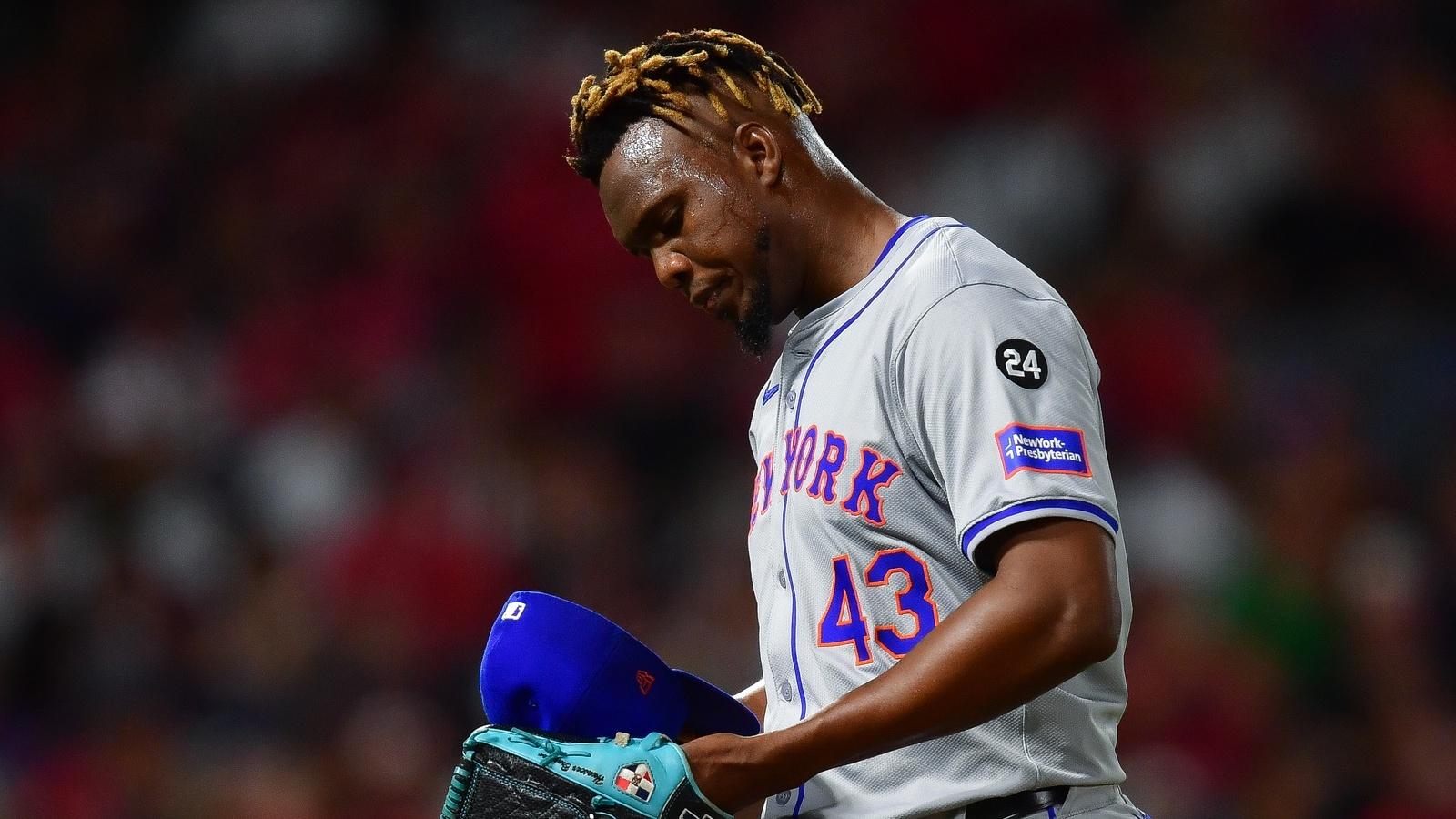 New York Mets pitcher Huascar Brazobn (43) reacts after being relieved against the Los Angeles Angels during the seventh inning at Angel Stadium.