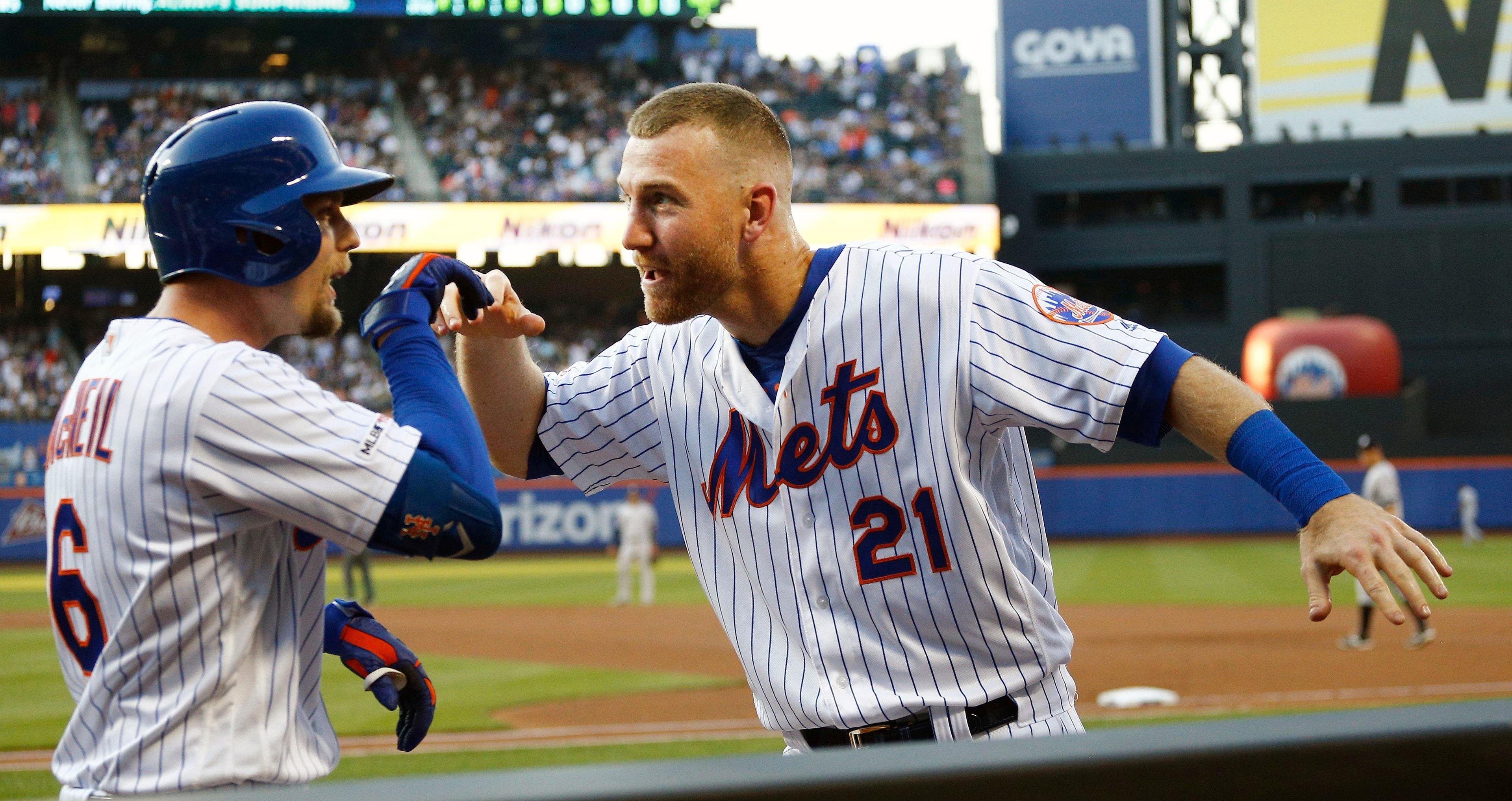 Jul 3, 2019; New York City, NY, USA; New York Mets right fielder Jeff McNeil (6) is congratulated by third baseman Todd Frazier (21) after hitting a solo home run against the New York Yankees during the first inning at Citi Field. Mandatory Credit: Andy Marlin-USA TODAY Sports / Andy Marlin