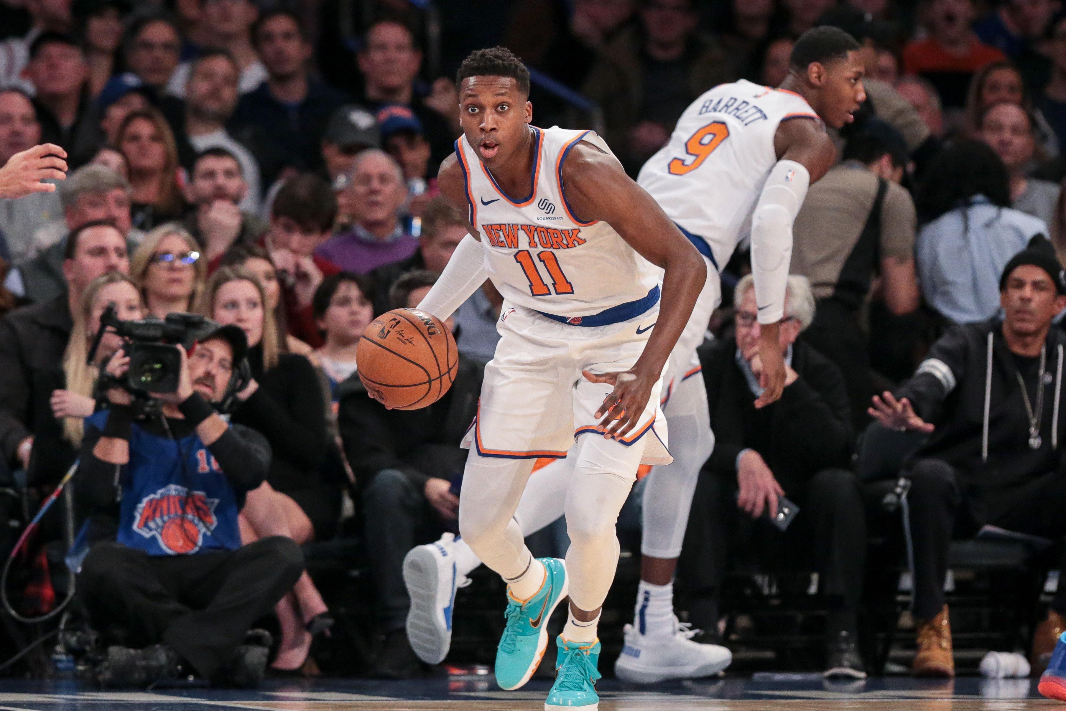 Nov 29, 2019; New York, NY, USA; New York Knicks guard Frank Ntilikina (11) dribbles up court during the first quarter at against the Philadelphia 76ers Madison Square Garden. Mandatory Credit: Vincent Carchietta-USA TODAY Sports