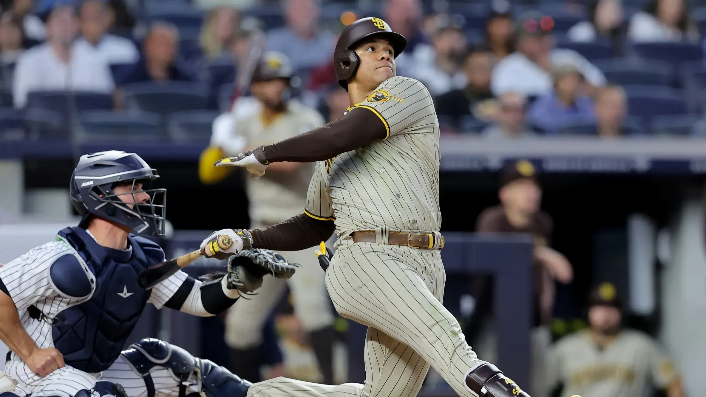 May 26, 2023; Bronx, New York, USA; San Diego Padres left fielder Juan Soto (22) follows through on a two run home run against the New York Yankees during the fifth inning at Yankee Stadium. / Brad Penner-USA TODAY Sports