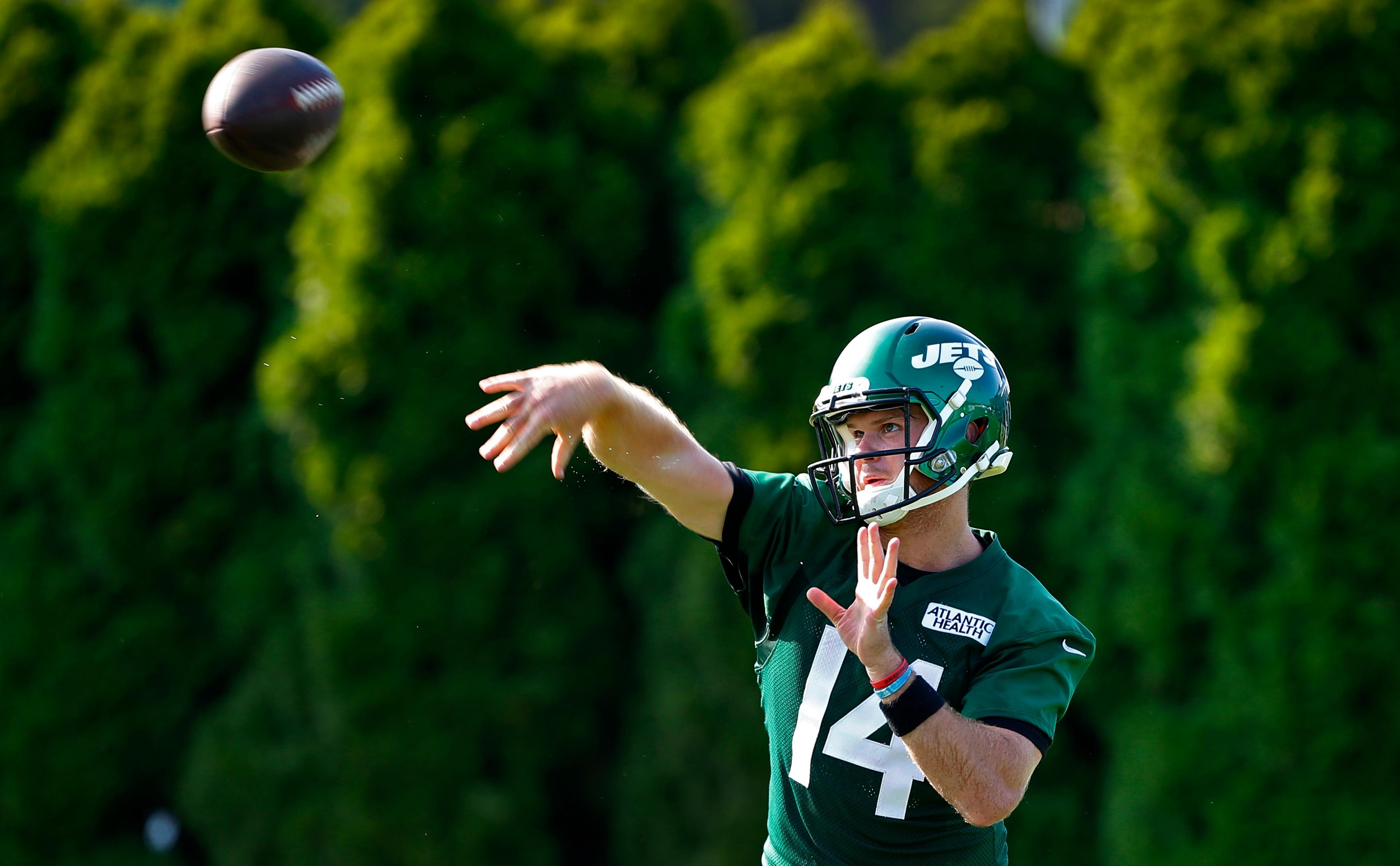 Jul 25, 2019; Florham Park, NJ, USA; New York Jets quarterback Sam Darnold (14) throws a pass during Jets training camp at Atlantic Health Center. Mandatory Credit: Noah K. Murray-USA TODAY Sports