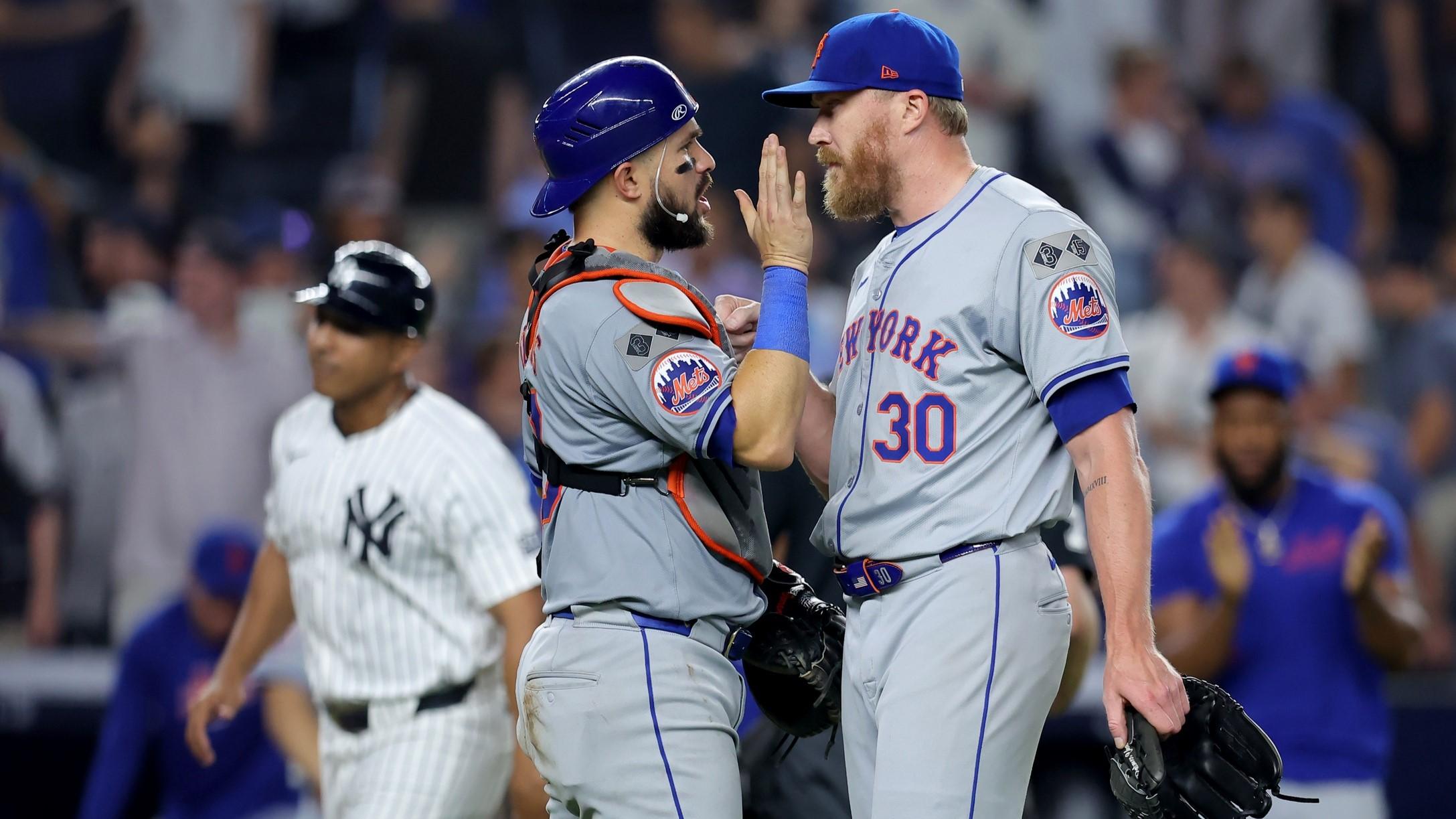 Jul 23, 2024; Bronx, New York, USA; New York Mets relief pitcher Jake Diekman (30) celebrates with catcher Luis Torrens (13) after defeating the New York Yankees at Yankee Stadium.
