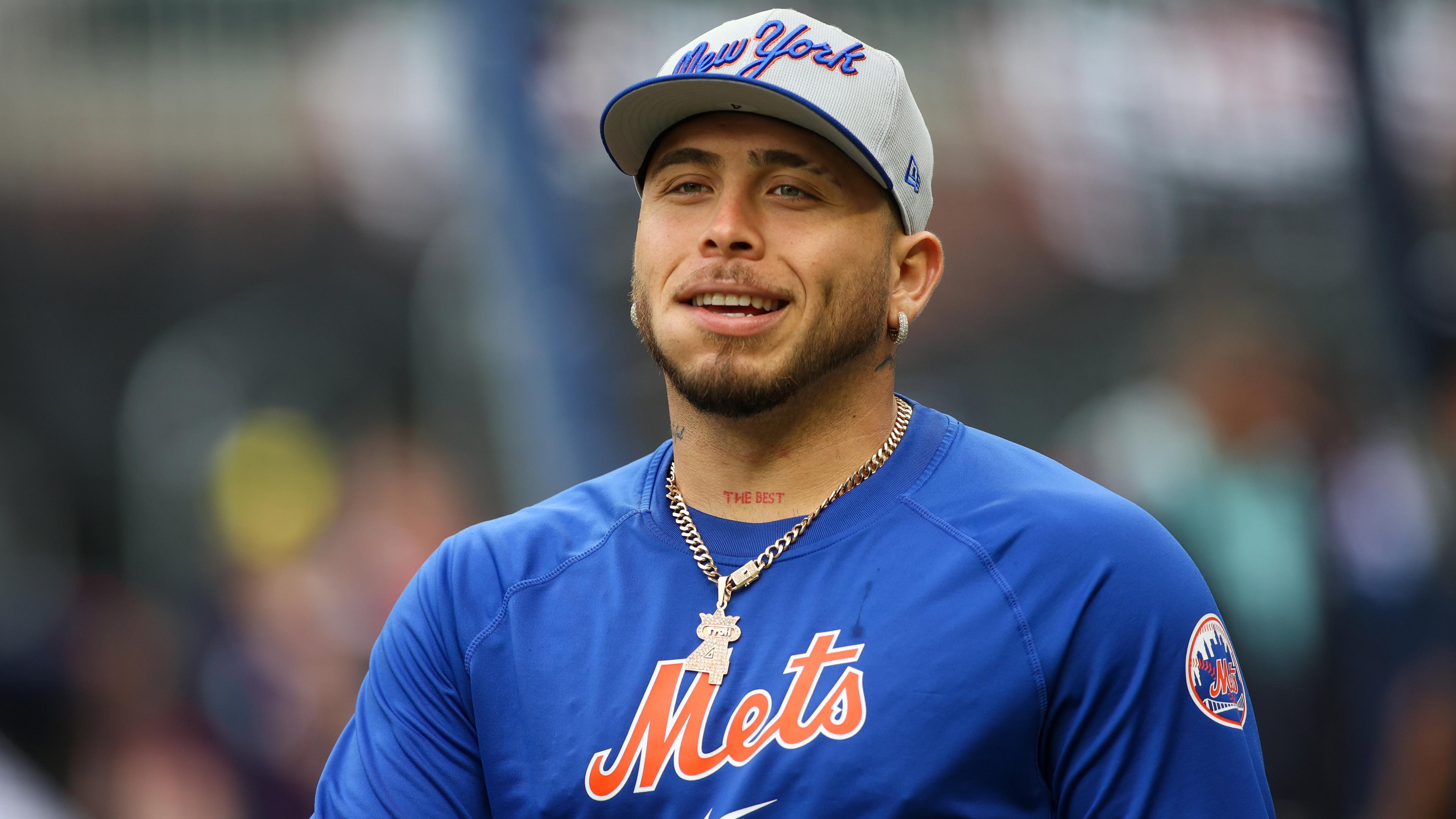 New York Mets catcher Francisco Alvarez (4) before batting practice at Truist Park. The game against the Atlanta Braves was postponed due to impending weather. / Brett Davis-USA TODAY