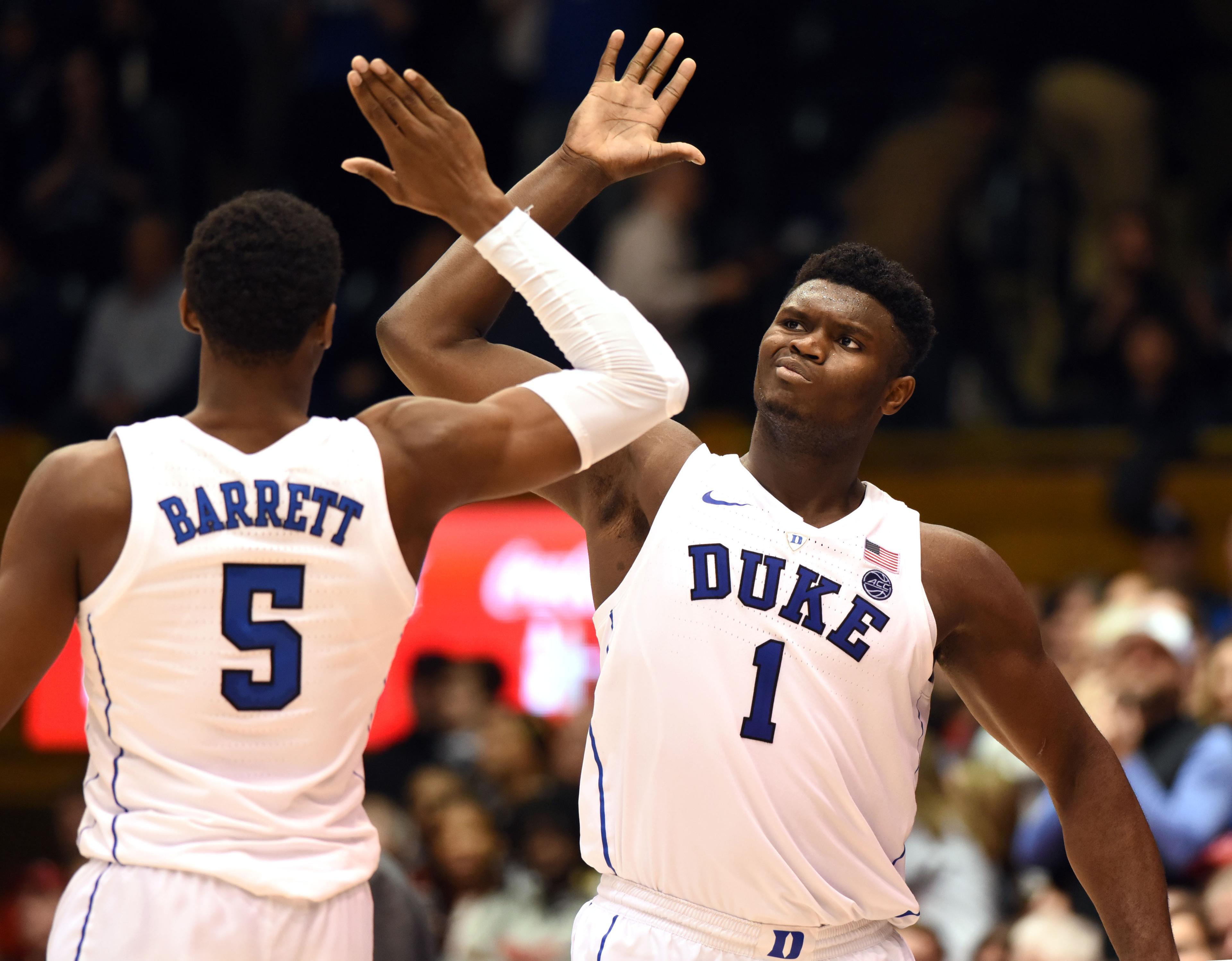 Dec 5, 2018; Durham, NC, USA; Duke Blue Devils forward Zion Williamson (1) and Duke Blue Devils forward R.J. Barrett (5) high five during the second half against the Hartford Hawks at Cameron Indoor Stadium. Mandatory Credit: Rob Kinnan-USA TODAY Sports