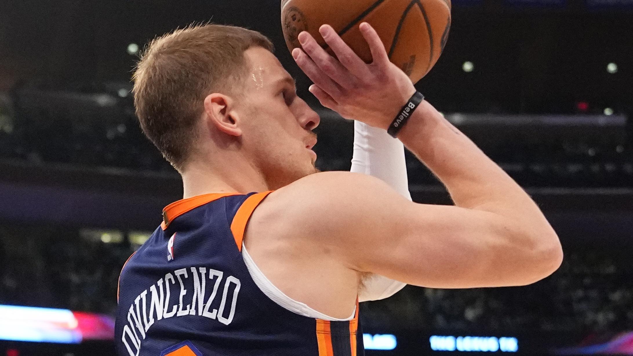 New York Knicks shooting guard Donte DiVincenzo (0) shoots a three point basket against the Los Angeles Clippers during the first half at Madison Square Garden / Brad Penner - USA TODAY Sports