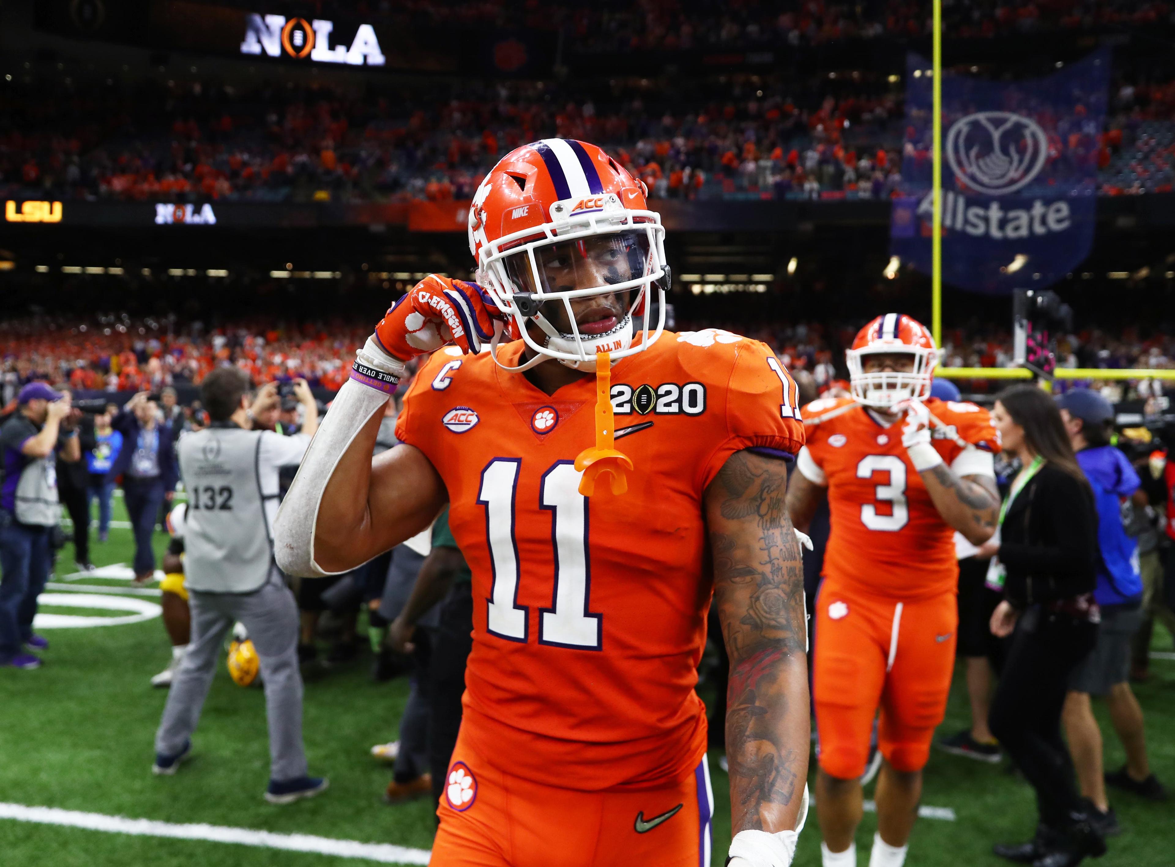 Jan 13, 2020; New Orleans, Louisiana, USA; Clemson Tigers linebacker Isaiah Simmons (11) reacts as he leaves the field after losing the College Football Playoff national championship game against the LSU Tigers at Mercedes-Benz Superdome. Mandatory Credit: Mark J. Rebilas-USA TODAY Sports / Mark J. Rebilas