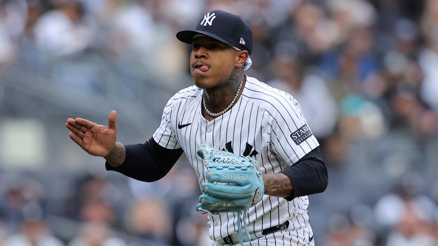 New York Yankees starting pitcher Marcus Stroman (0) claps after striking out Toronto Blue Jays first baseman Vladimir Guerrero Jr. (not pictured) during the fifth inning at Yankee Stadium. / Brad Penner-USA TODAY Sports