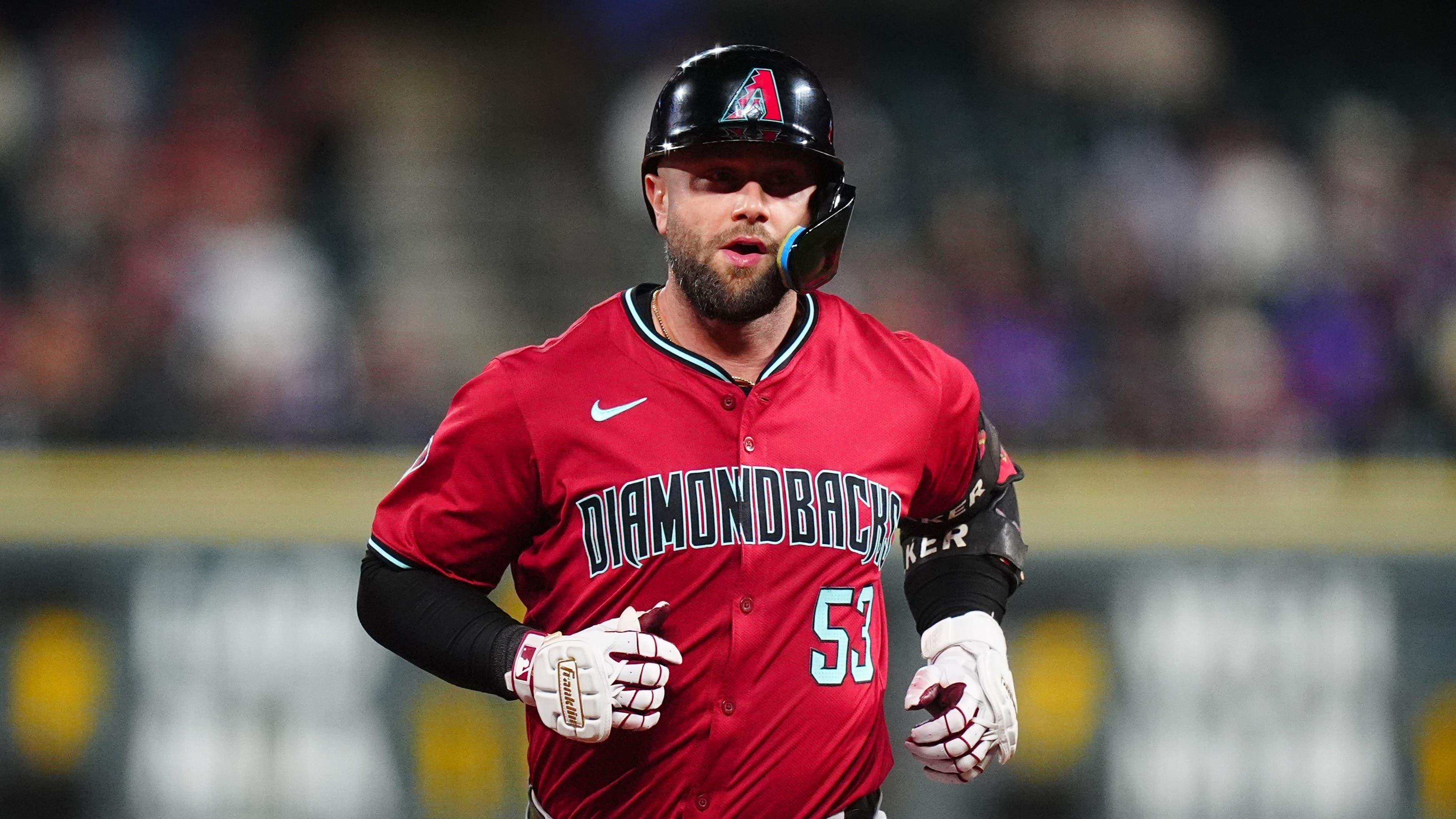 Arizona Diamondbacks first base Christian Walker (53) runs off a solo home run in the eighth inning against the Colorado Rockies at Coors Field. 