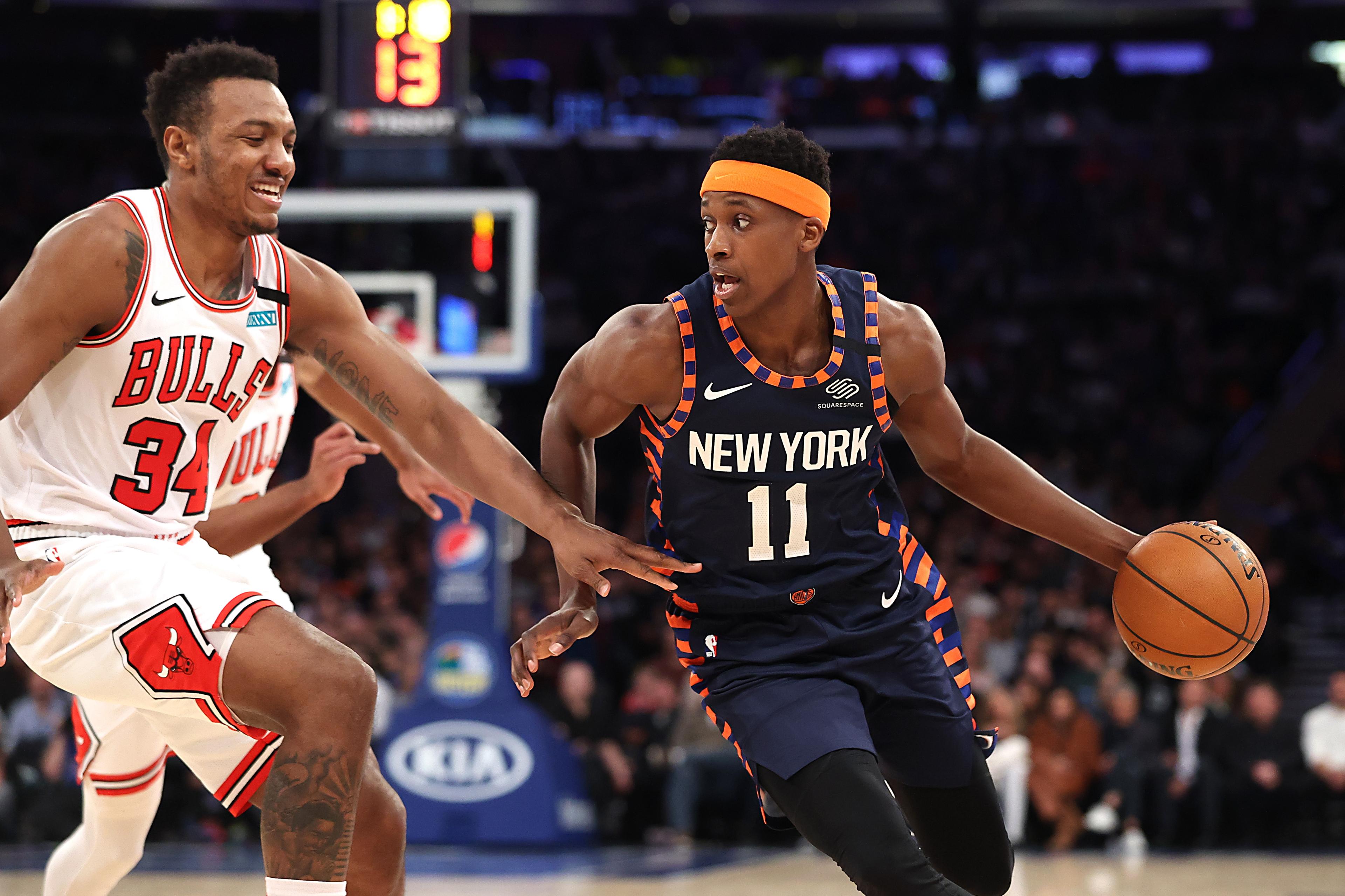 Feb 29, 2020; New York, New York, USA; New York Knicks guard Frank Ntilikina (11) dribbles as Chicago Bulls center Wendell Carter Jr. (34) defends during the second half at Madison Square Garden. / Vincent Carchietta-USA TODAY Sports