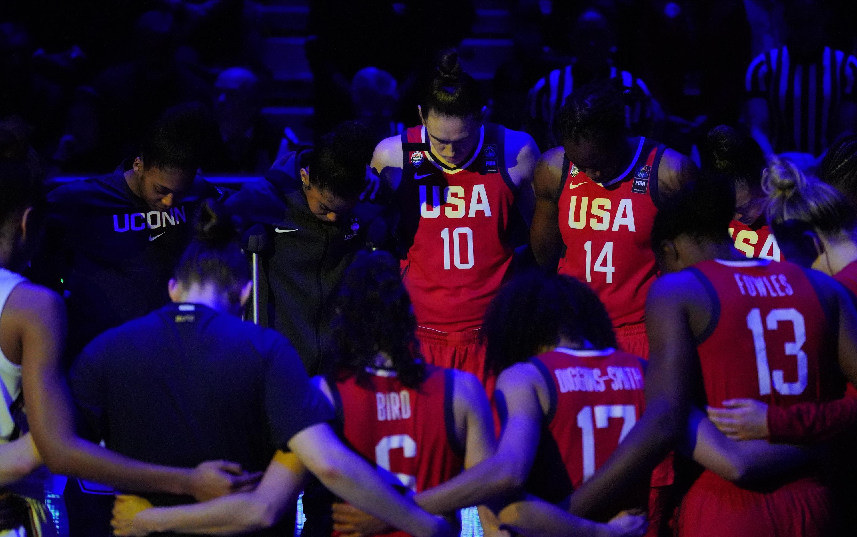 Jan 27, 2020; Hartford, Connecticut, USA; The UConn Huskies and 2020 USA Womens National Team gather in center court in honor of the passing of NBA star Kobe Bryant and his daughter before the start of the game at XL Center. Mandatory Credit: David Butler II-USA TODAY Sports