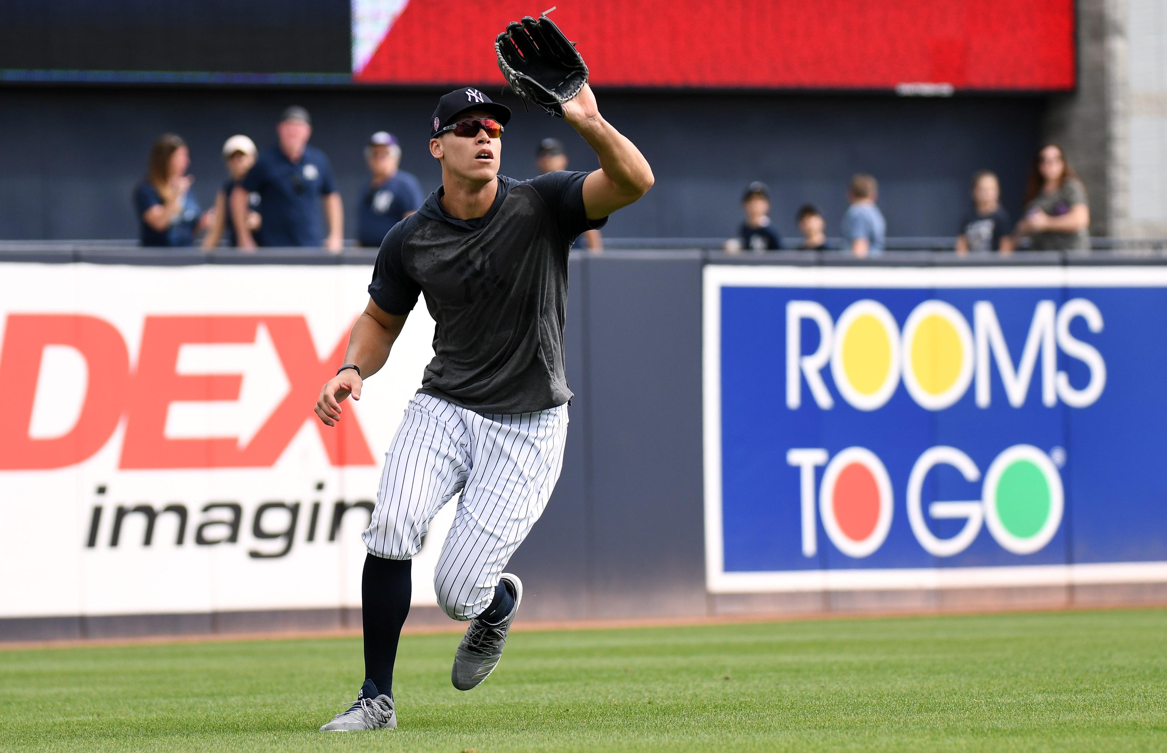 Feb 19, 2020; Tampa, Florida, USA; New York Yankees outfielder Aaron Judge (99) waits for a fly ball during spring training at George M. Steinbrenner Field. Mandatory Credit: Jonathan Dyer-USA TODAY Sports / Jonathan Dyer