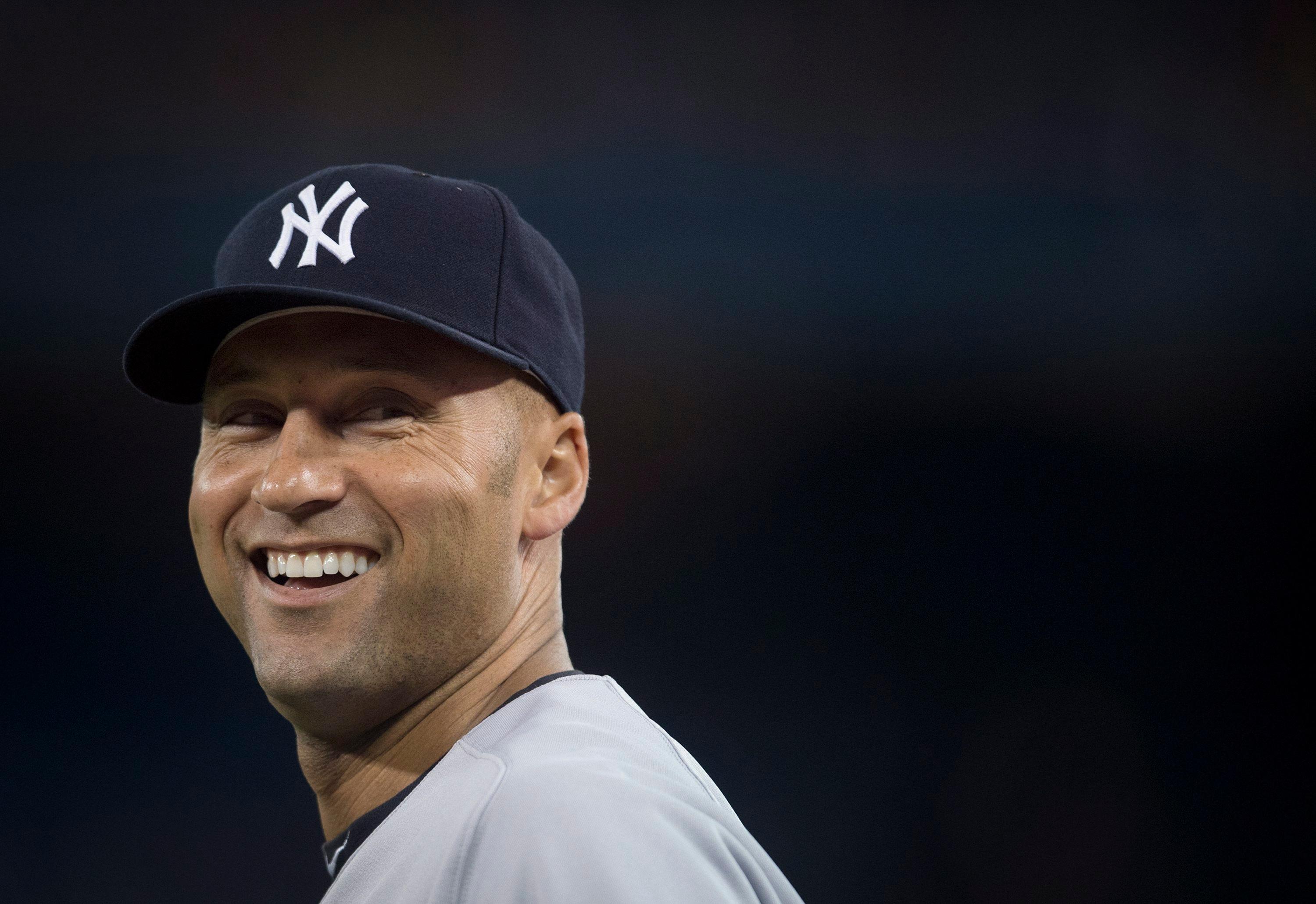 Yankees captain Derek Jeter is seen smiling before the game in Toronto. Jeter has hit .267 in his final season with the Yankees.