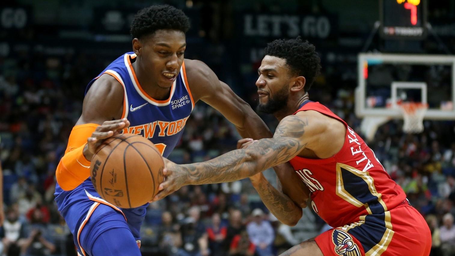Oct 30, 2021; New Orleans, Louisiana, USA; New York Knicks guard RJ Barrett (9) is defended by New Orleans Pelicans guard Nickeil Alexander-Walker (6) in the second quarter at the Smoothie King Center. / Chuck Cook-USA TODAY Sports