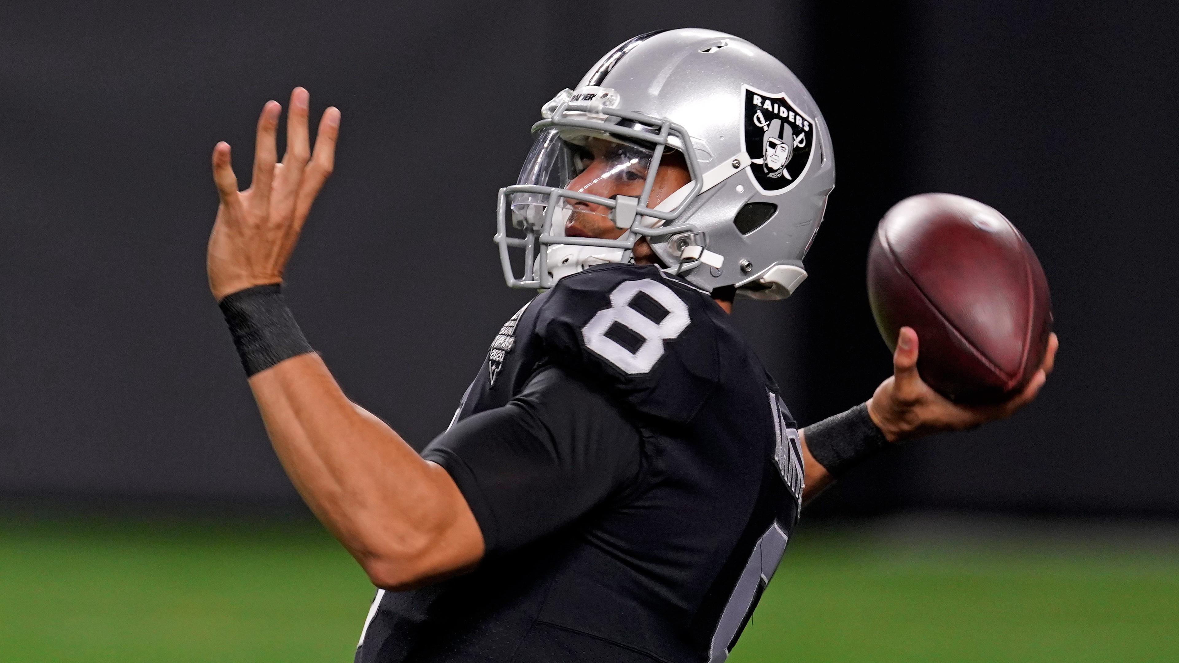 Las Vegas Raiders quarterback Marcus Mariota (8) warms up before a game against the Miami Dolphins at Allegiant Stadium. / Kirby Lee-USA TODAY Sports