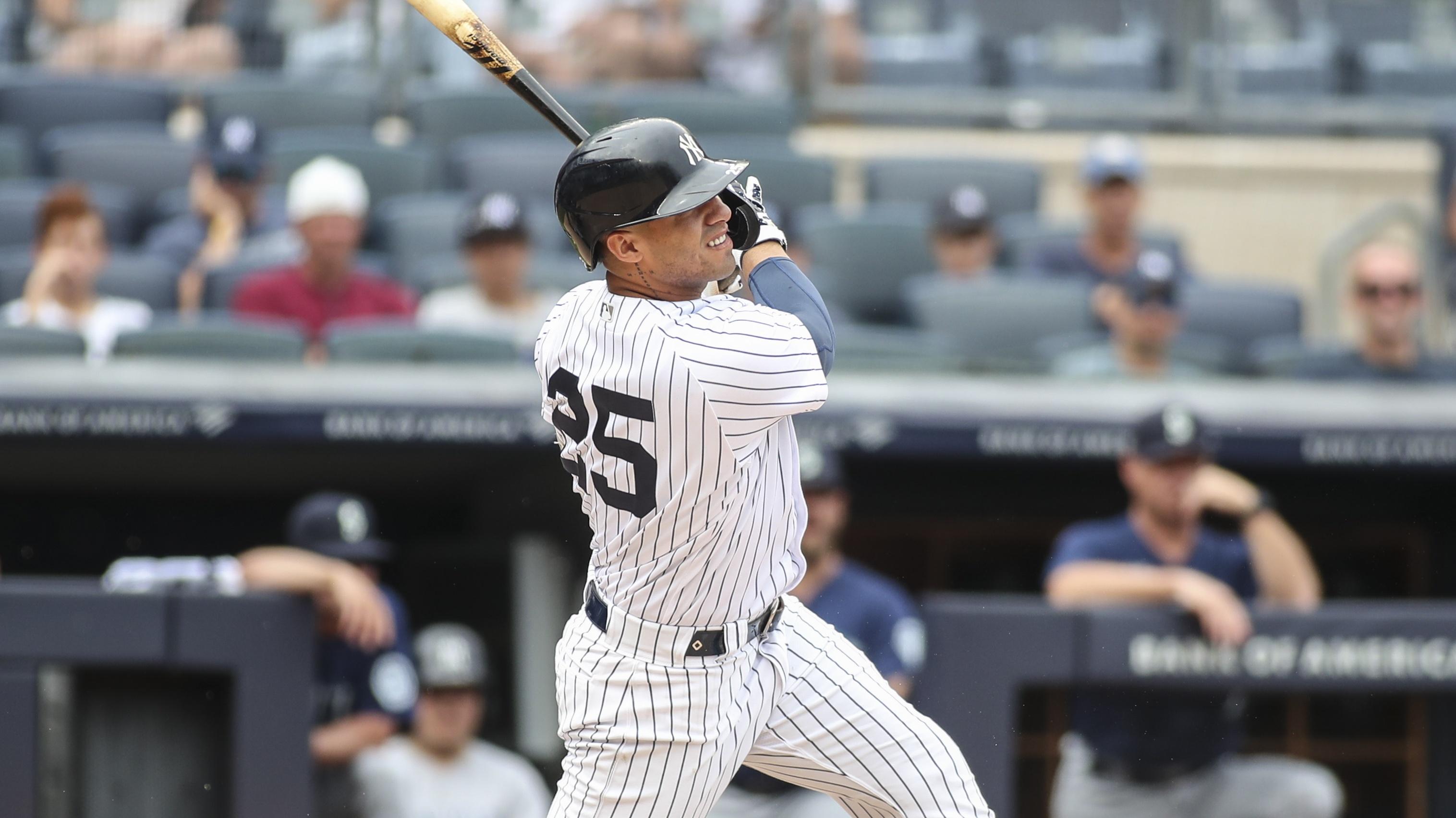 Aug 8, 2021; Bronx, New York, USA; New York Yankees shortstop Gleyber Torres (25) hits a single in the fourth inning against the Seattle Mariners at Yankee Stadium. / © Wendell Cruz-USA TODAY Sports