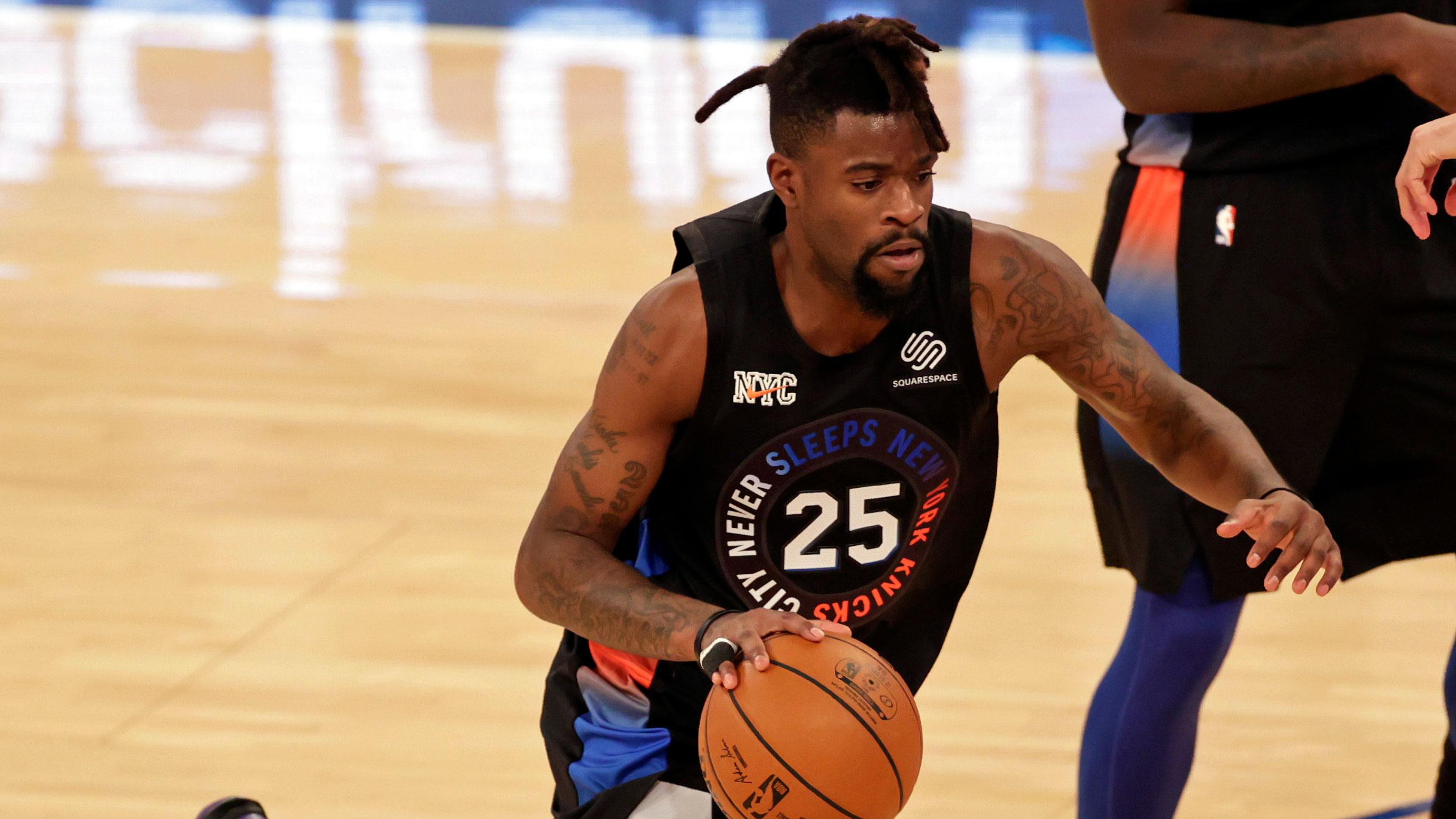 Dec 26, 2020; New York, New York, USA; New York Knicks forward Reggie Bullock in action during the second half of an NBA basketball game against the Philadelphia 76ers on Saturday, Dec. 26, 2020, in New York. The 76ers defeated the Knicks 109-89 at Madison Square Garden / Adam Hunger/Pool Photo-USA TODAY Sports