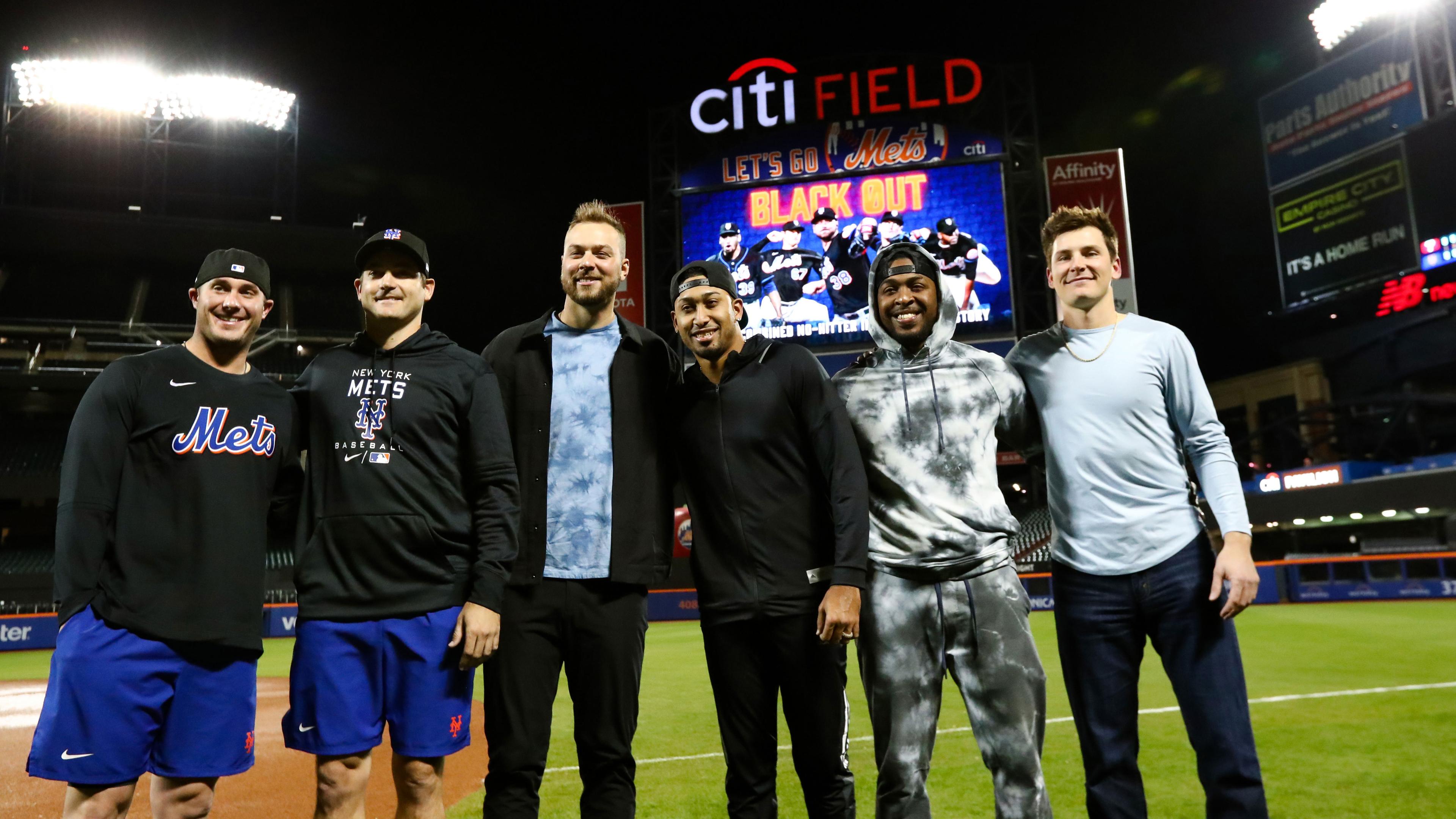 Apr 29, 2022; New York City, New York, USA; New York Mets catcher James McCann (33), relief pitcher Seth Lugo (67), relief pitcher Tylor Megill (38), relief pitcher Edwin Diaz (39), relief pitcher Joely Rodriguez (30), and relief pitcher Drew Smith (62) pose for a photo in front of the video board after a combined no-hitter against the Philadelphia Phillies at Citi Field. / Jessica Alcheh-USA TODAY Sports