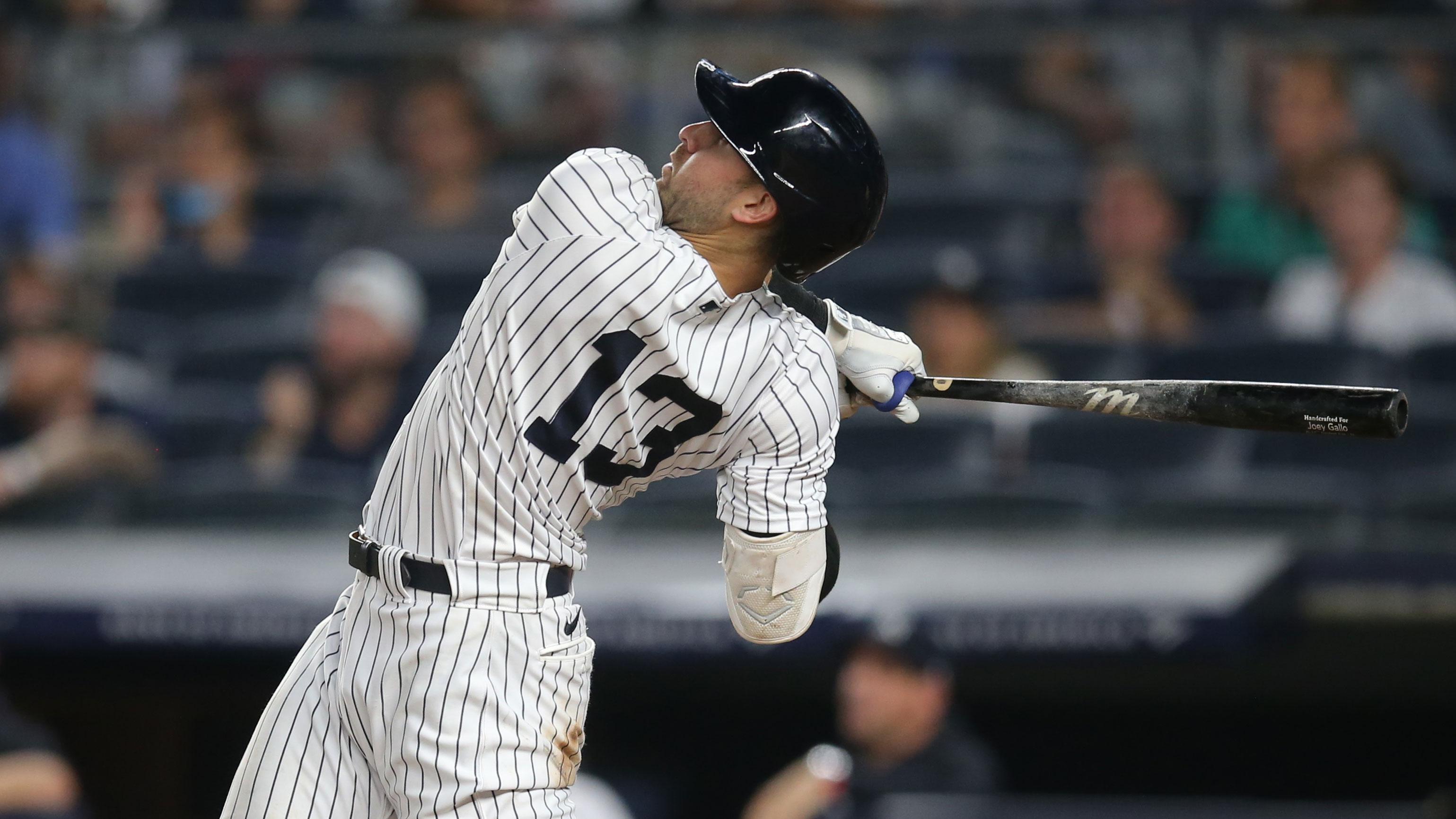 Aug 5, 2021; Bronx, New York, USA; New York Yankees left fielder Joey Gallo (13) follows through on a three run home run against the Seattle Mariners during the seventh inning at Yankee Stadium. / Brad Penner-USA TODAY Sports