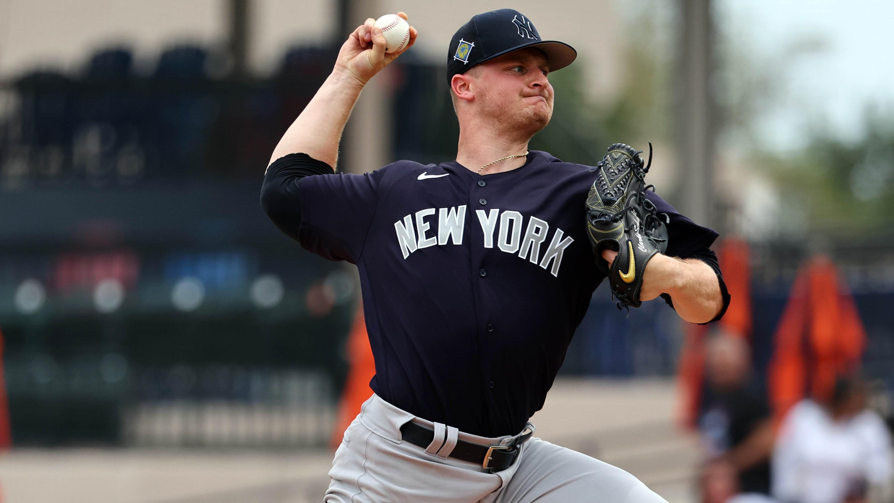 Mar 24, 2022; Lakeland, Florida, USA; New York Yankees pitcher Clarke Schmidt (86) throws a pitch during the first inning against the Detroit Tigers during spring training at Publix Field at Joker Marchant Stadium. Mandatory Credit: Kim Klement-USA TODAY Sports / Kim Klement-USA TODAY Sports
