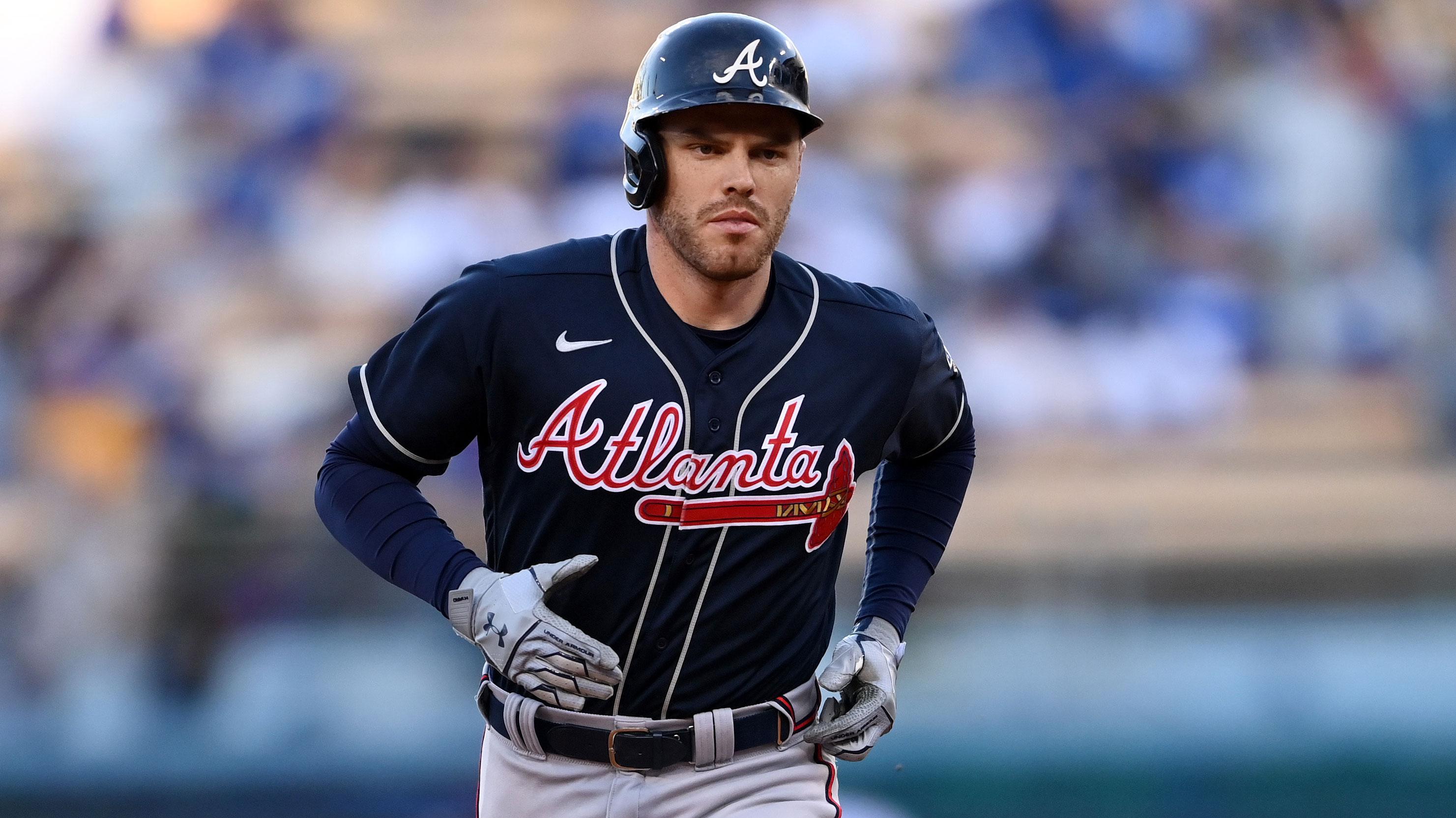 Oct 21, 2021; Los Angeles, California, USA; Atlanta Braves first baseman Freddie Freeman (5) runs the bases after hitting a two run home run in the first inning against the Los Angeles Dodgers during game five of the 2021 NLCS at Dodger Stadium. / Jayne Kamin-Oncea-USA TODAY Sports
