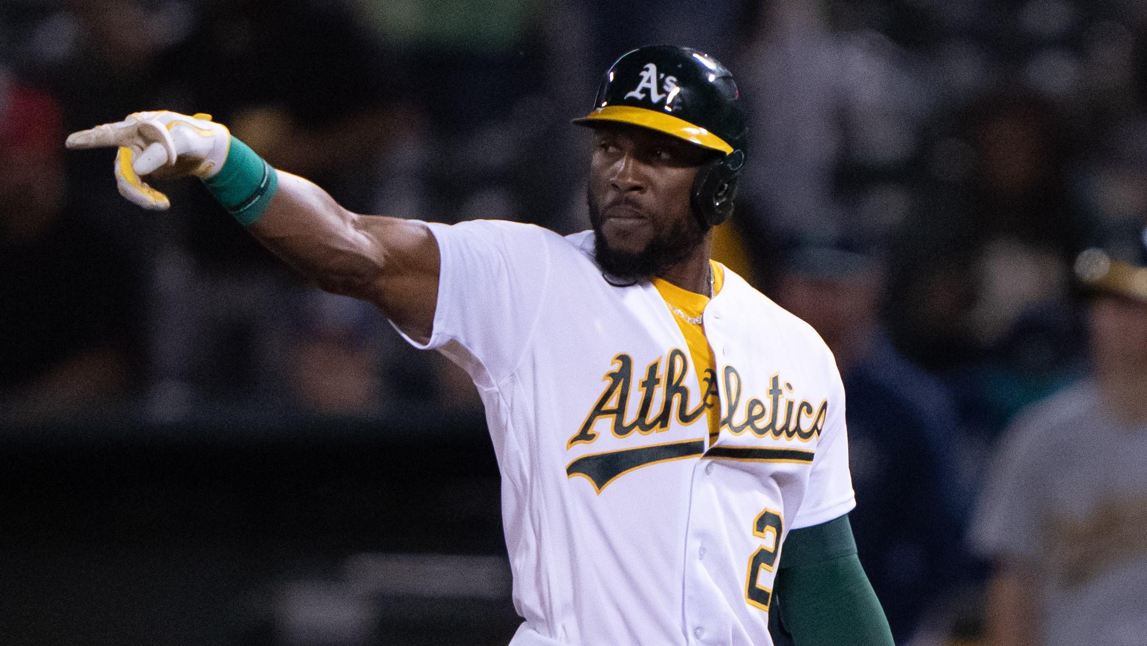 Sep 20, 2021; Oakland, California, USA; Oakland Athletics center fielder Starling Marte (2) points to a teammate during the eighth inning against the Seattle Mariners at RingCentral Coliseum. / Stan Szeto-USA TODAY Sports