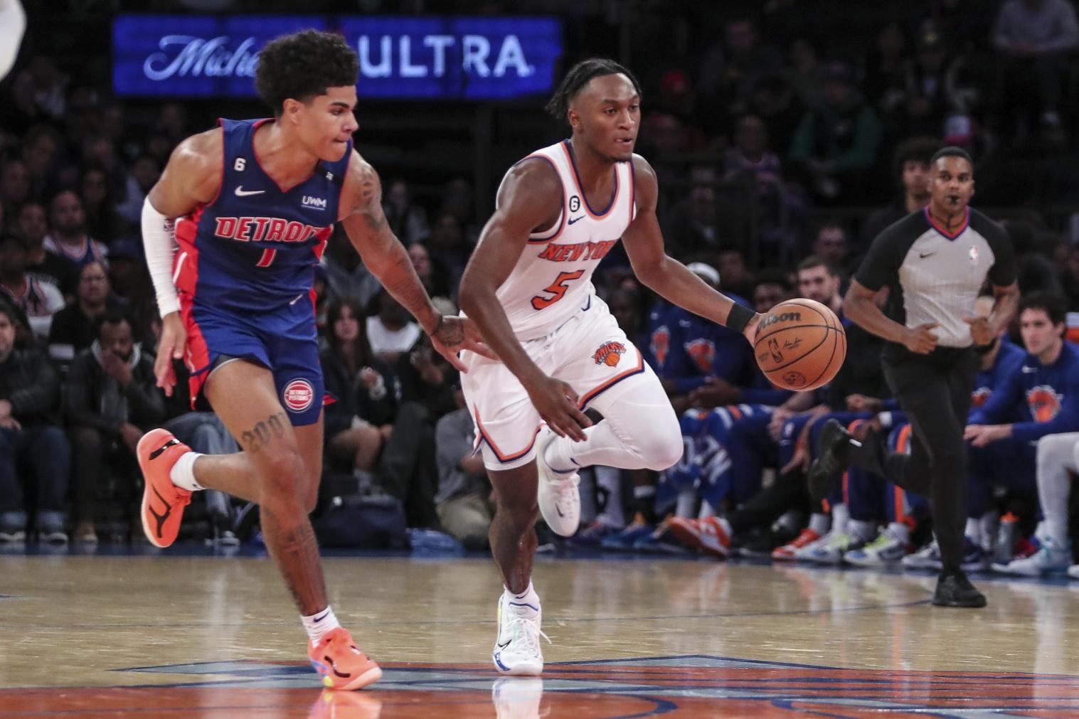 New York Knicks guard Immanuel Quickley (5) drives past Detroit Pistons guard Killian Hayes (7) in the fourth quarter at Madison Square Garden. / Wendell Cruz-USA TODAY Sports