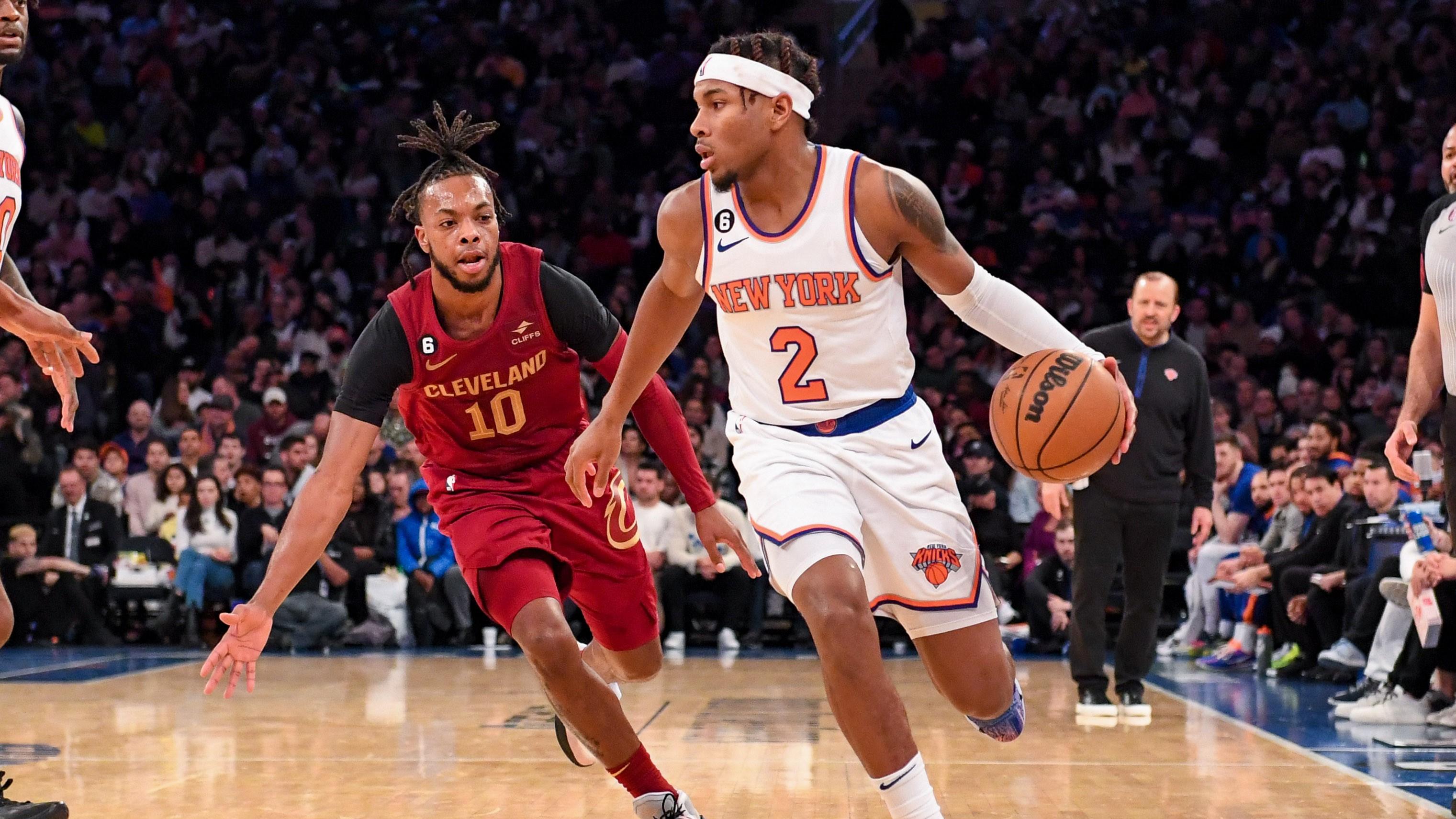 Dec 4, 2022; New York, New York, USA; New York Knicks guard Miles McBride (2) dribbles the ball chased by Cleveland Cavaliers guard Darius Garland (10) during the fourth quarter at Madison Square Garden. Mandatory Credit: Dennis Schneidler-USA TODAY Sports / © Dennis Schneidler-USA TODAY Sports