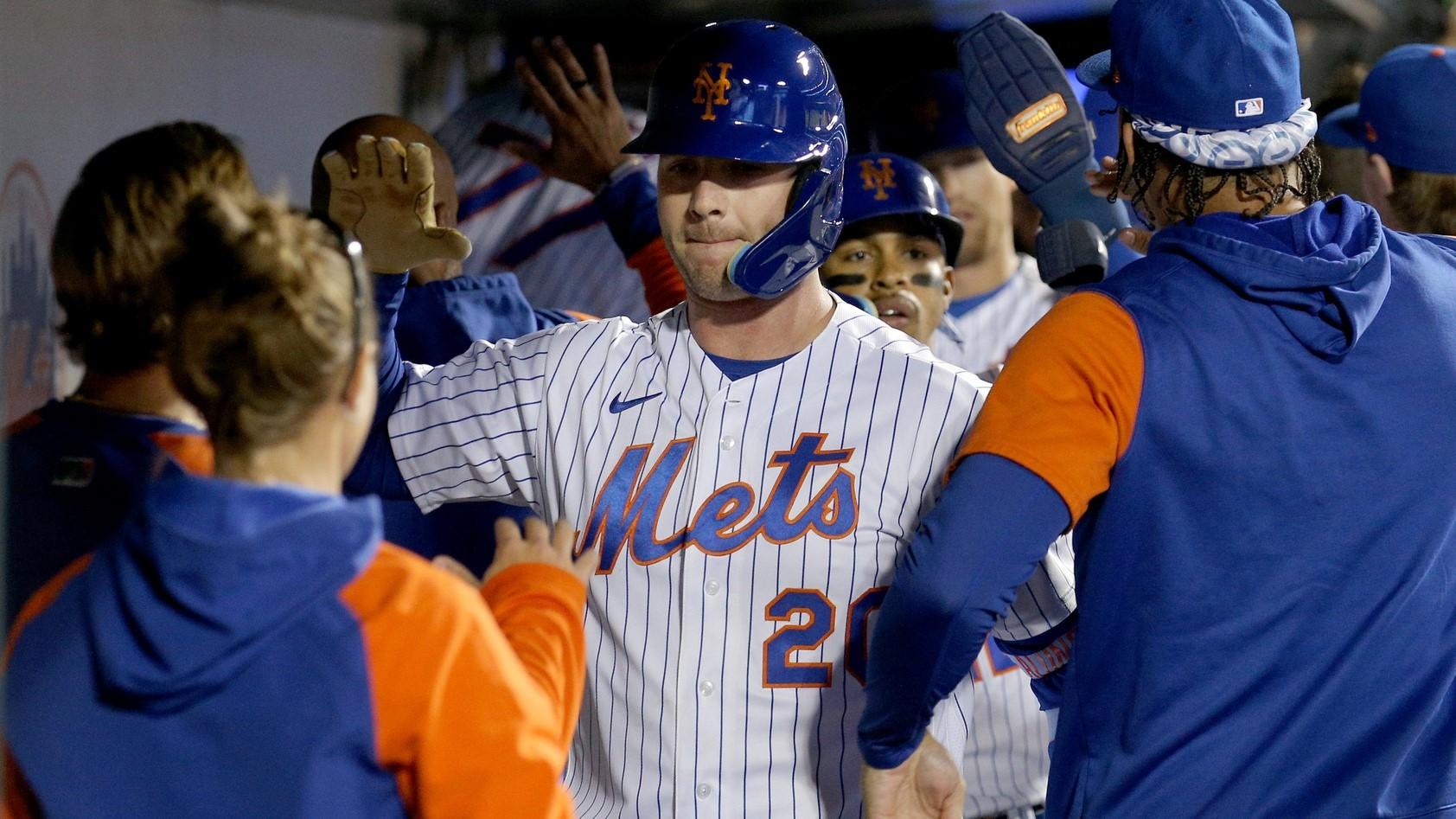 Sep 27, 2022; New York City, New York, USA; New York Mets first baseman Pete Alonso (20) celebrates his three run home run against the Miami Marlins in the dugout with teammates during the fourth inning at Citi Field. / Brad Penner-USA TODAY Sports