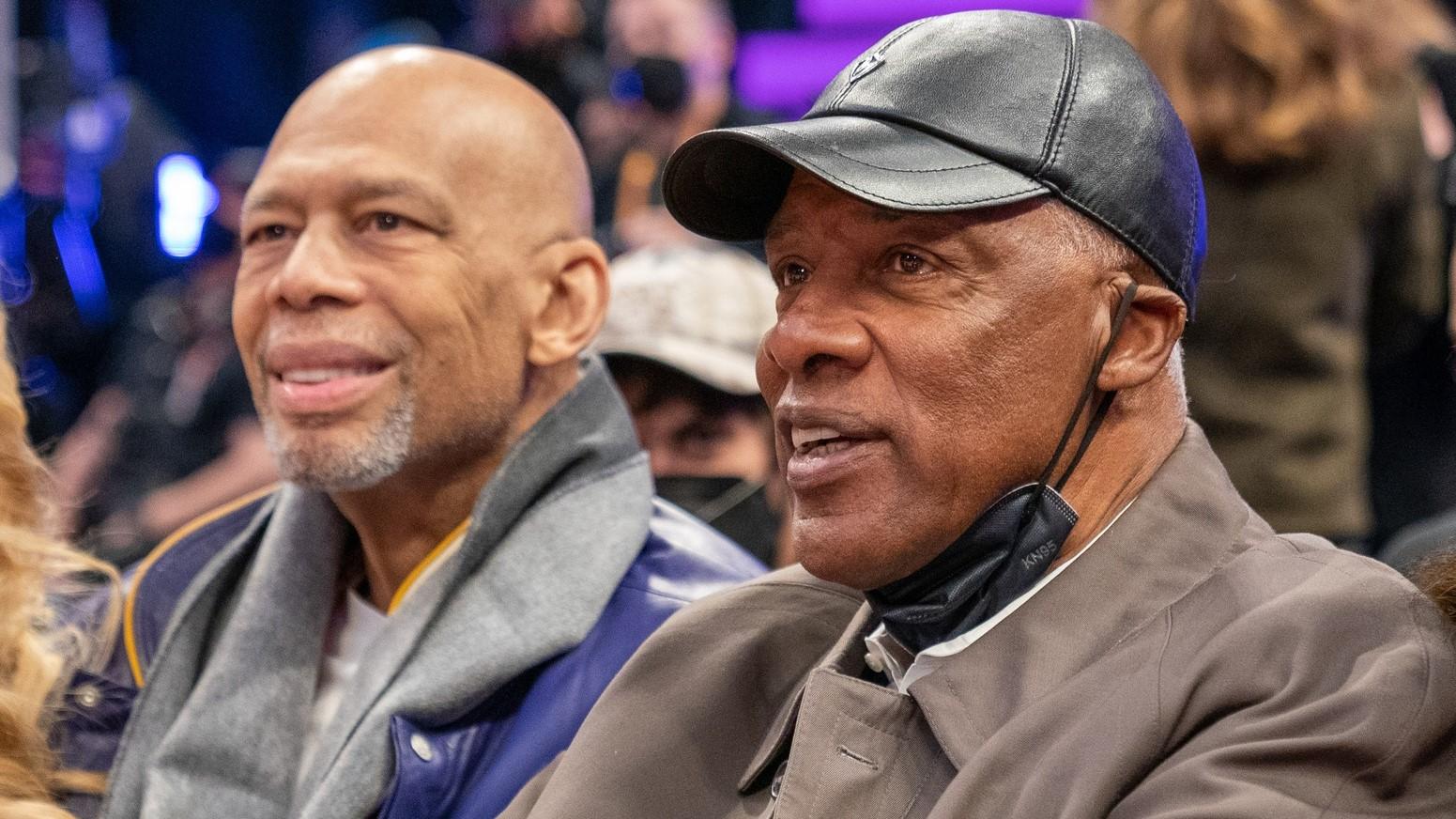 February 19, 2022; Cleveland, OH, USA; NBA great Kareem Abdul-Jabbar (left) and NBA great Julius Erving (right) during the Skills Challenge during the 2022 NBA All-Star Saturday Night at Rocket Mortgage Field House. / Kyle Terada-USA TODAY Sports