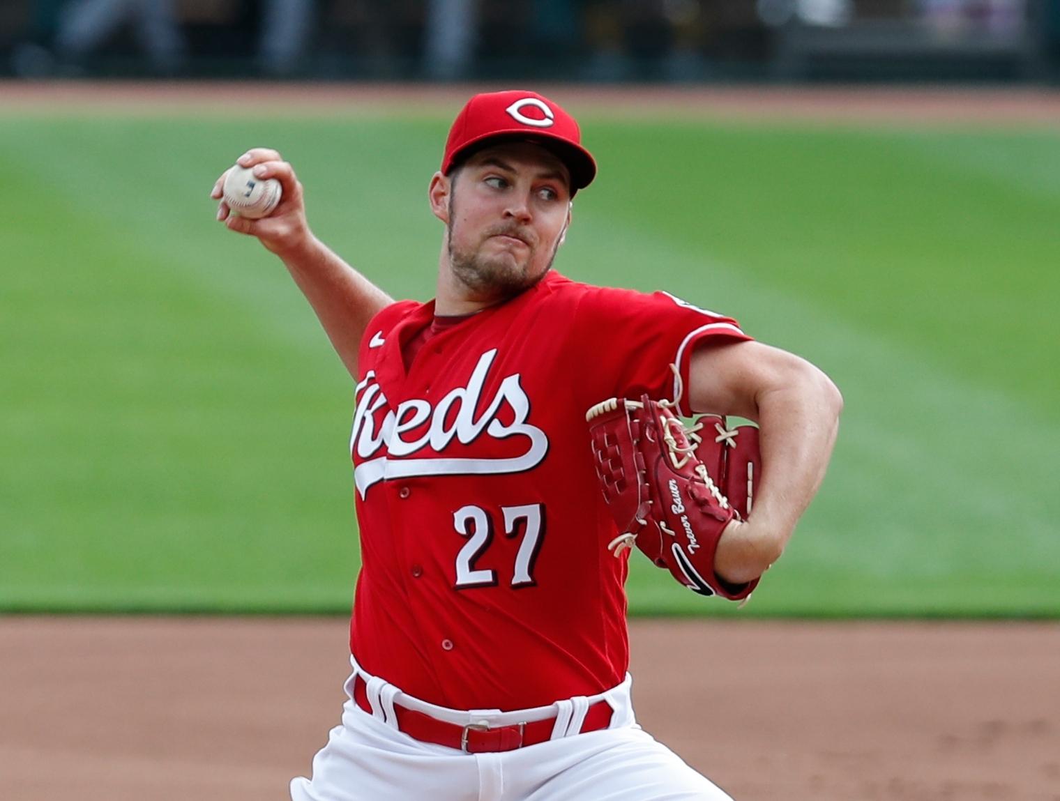 Sep 14, 2020; Cincinnati, Ohio, USA; Cincinnati Reds starting pitcher Trevor Bauer (27) throws against the Pittsburgh Pirates in the first inning during Game One of a doubleheader at Great American Ball Park. Mandatory Credit: David Kohl-USA TODAY Sports / © David Kohl-USA TODAY Sports