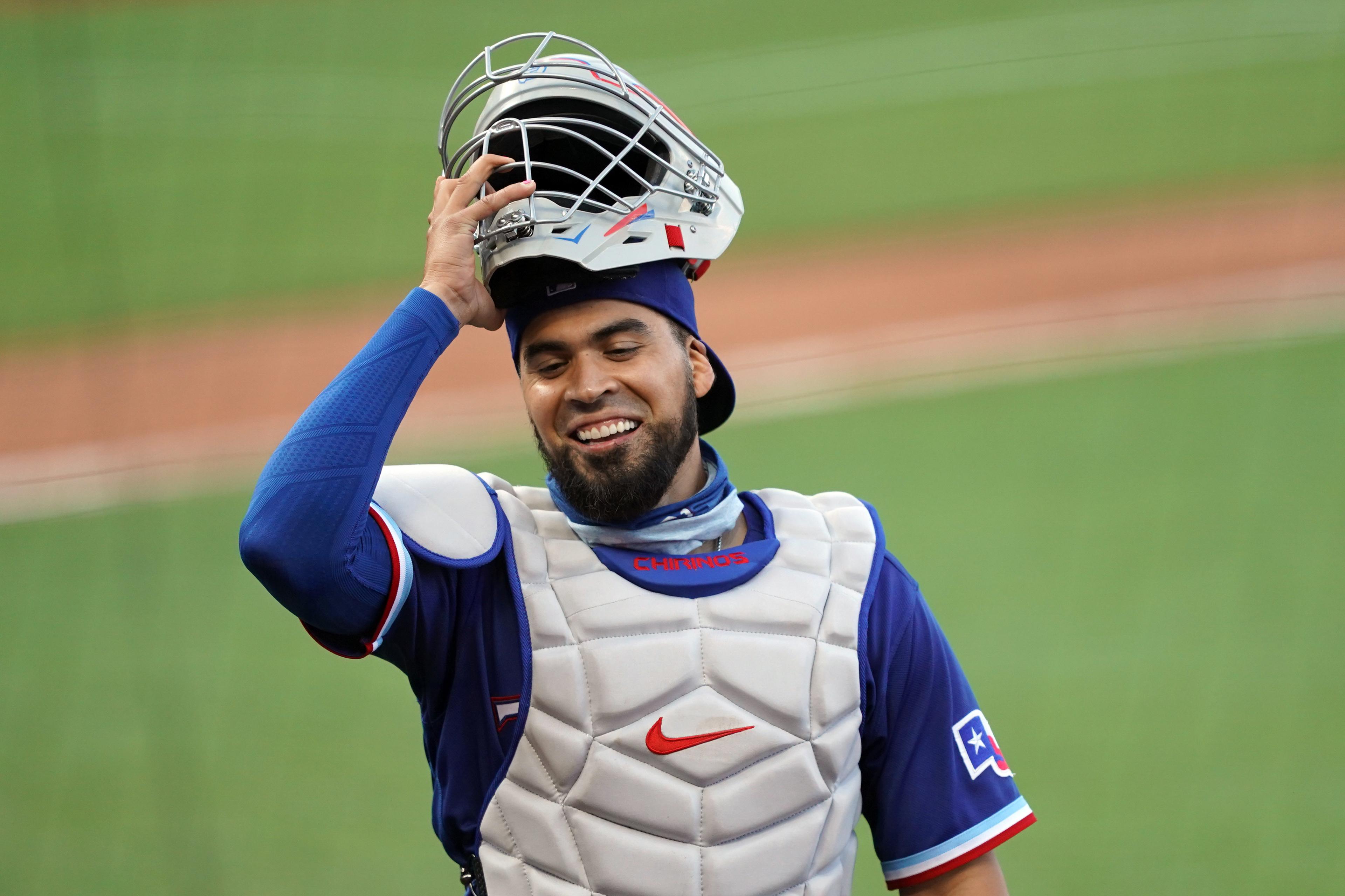 Aug 1, 2020; San Francisco, California, USA; Texas Rangers catcher Robinson Chirinos (61) smiles on the field at the end of the second inning against the San Francisco Giants at Oracle Park. Mandatory Credit: Darren Yamashita-USA TODAY Sports / © Darren Yamashita-USA TODAY Sports