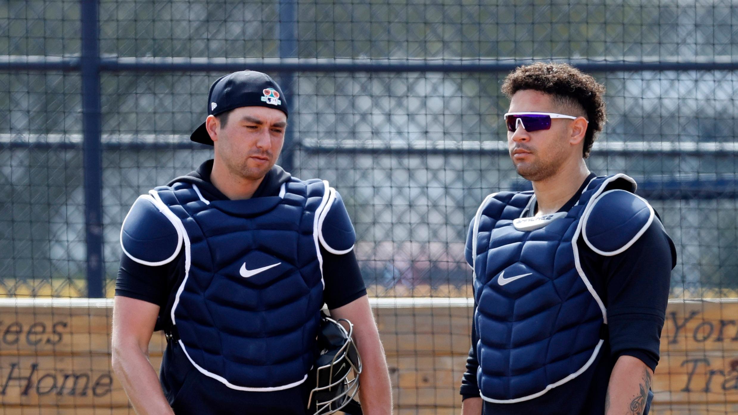 New York Yankees catcher Kyle Higashioka (66) and New York Yankees catcher Gary Sanchez (24) talk during spring training at the Yankees player development complex. / Kim Klement-USA TODAY Sports