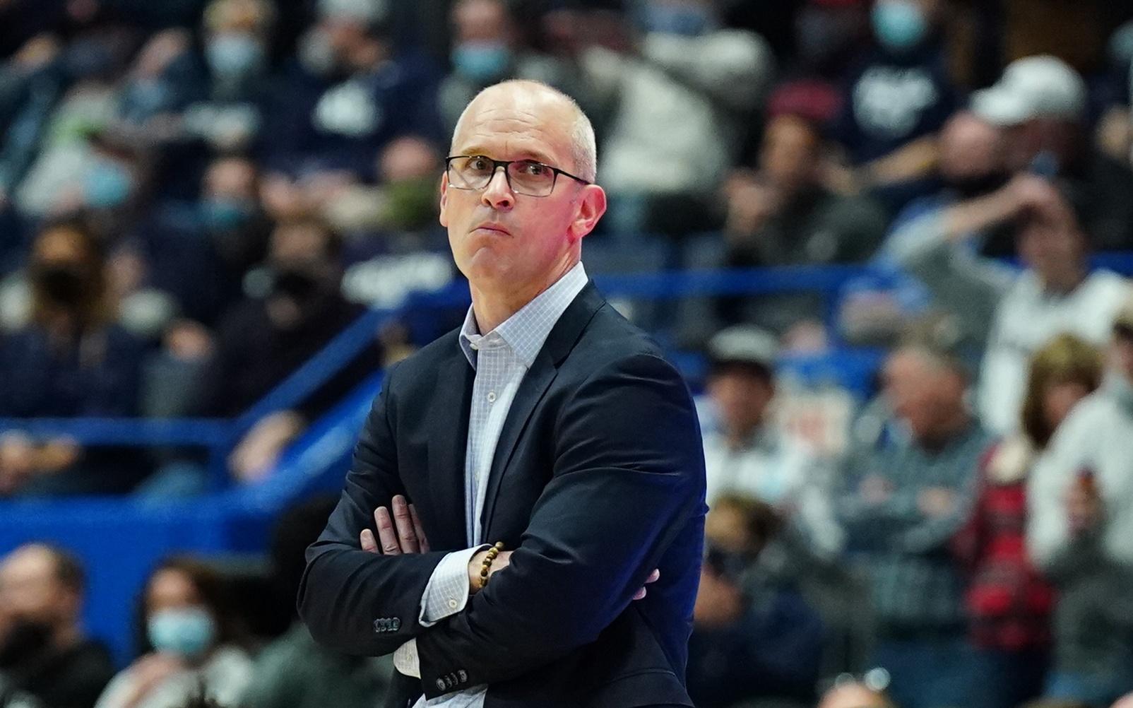 Dec 18, 2021; Hartford, Connecticut, USA; Connecticut Huskies head coach Dan Hurley (left) looks over to Providence Friars head coach Jeff Battle from the sideline in the first half at XL Center. Mandatory Credit: David Butler II-USA TODAY Sports / © David Butler II-USA TODAY Sports