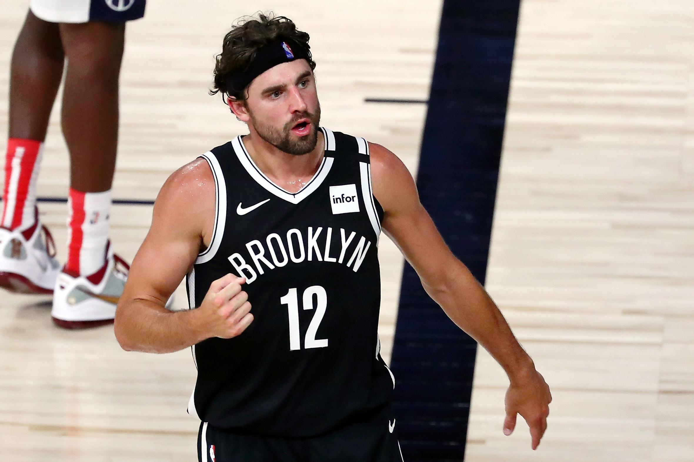 Aug 2, 2020; Lake Buena Vista, Florida, USA; Brooklyn Nets forward Joe Harris (12) reacts after a play against the Washington Wizards in the second half of a NBA basketball game at HP Field House. The Brooklyn Nets won 118-110. Mandatory Credit: Kim Klement-USA TODAY Sports / © Kim Klement-USA TODAY Sports