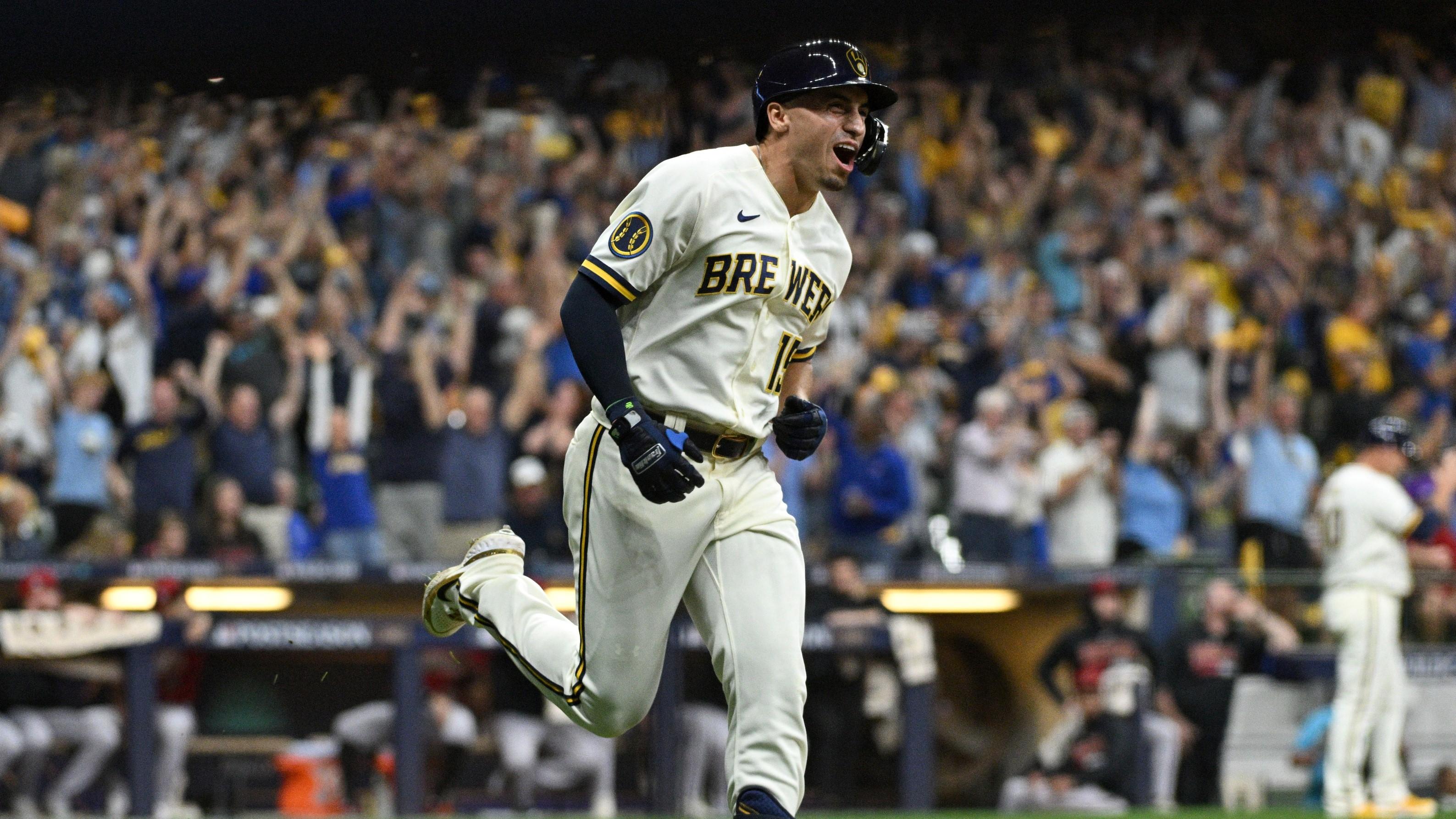 Oct 3, 2023; Milwaukee, Wisconsin, USA; Milwaukee Brewers right fielder Tyrone Taylor (15) runs after hitting a home run in the second inning against the Arizona Diamondbacks during game one of the Wildcard series for the 2023 MLB playoffs at American Family Field. / Michael McLoone-USA TODAY Sports