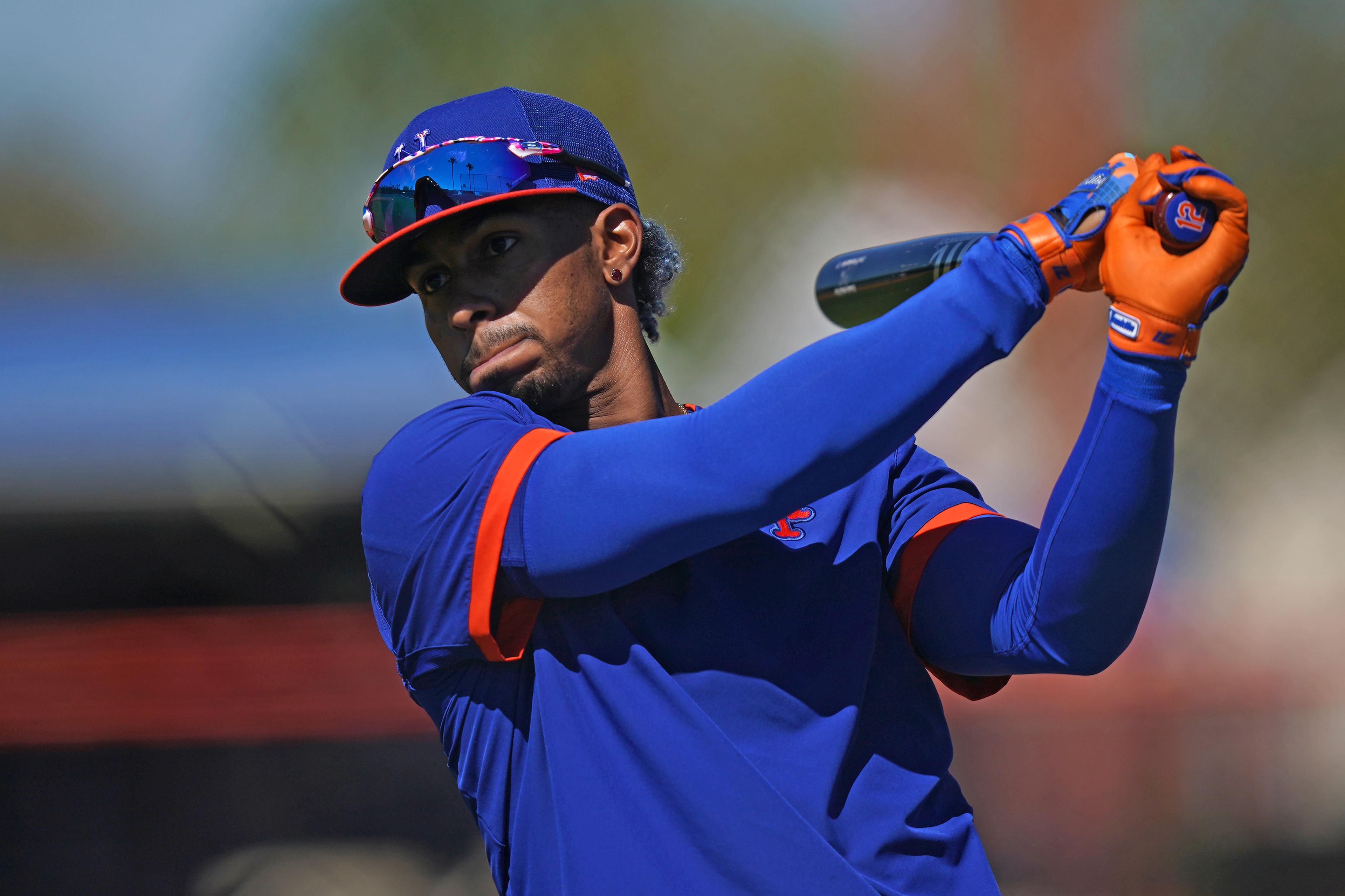 Feb 25, 2021; Port St. Lucie, Florida, USA; New York Mets shortstop Francisco Lindor (12) swings a bat during spring training workouts at Clover Park. / Jasen Vinlove-USA TODAY Sports