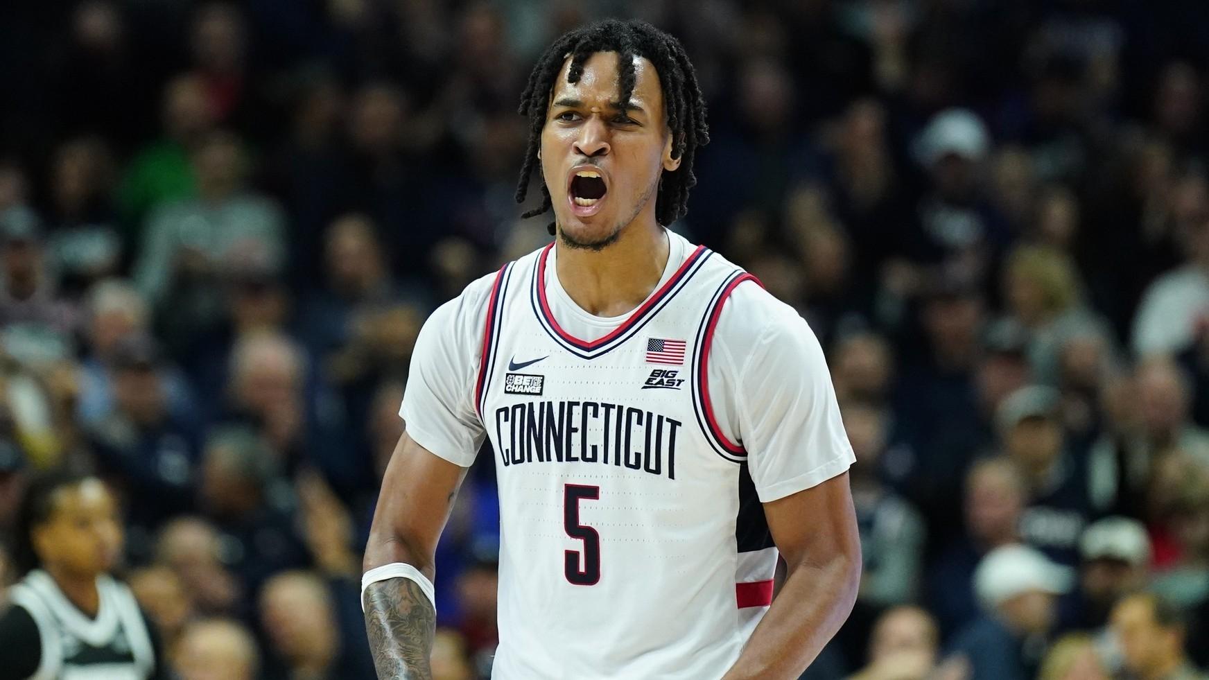 UConn Huskies guard Stephon Castle (5) reacts after his three point basket against the Providence Friars in the second half at Harry A. Gampel Pavilion. / David Butler II-USA TODAY Sports