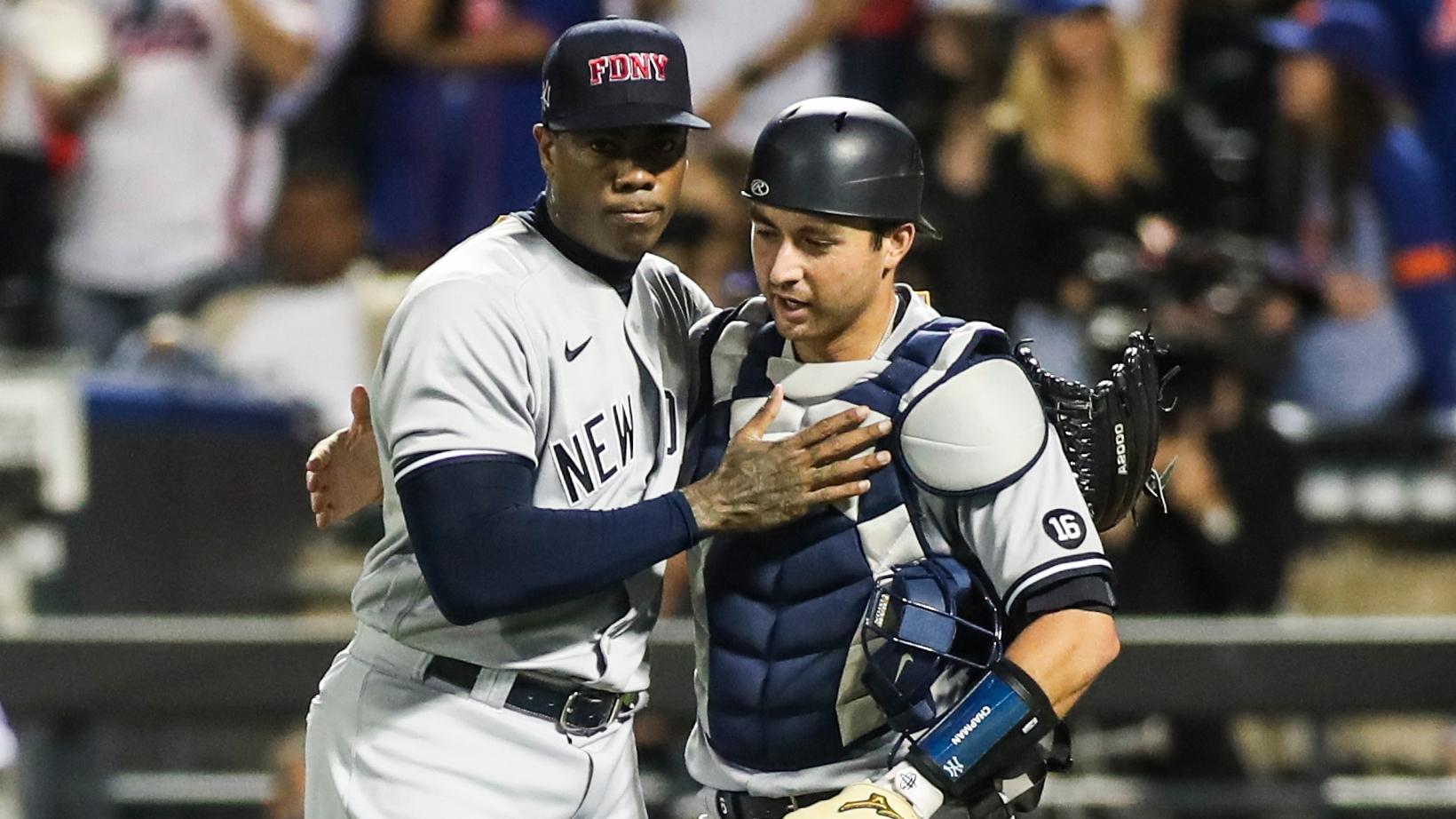 Sep 11, 2021; New York City, New York, USA; New York Yankees pitcher Aroldis Chapman (54) and catcher Kyle Higashioka (66) celebrate after defeating the New York Mets 8-7 at Citi Field. / Wendell Cruz-USA TODAY Sports