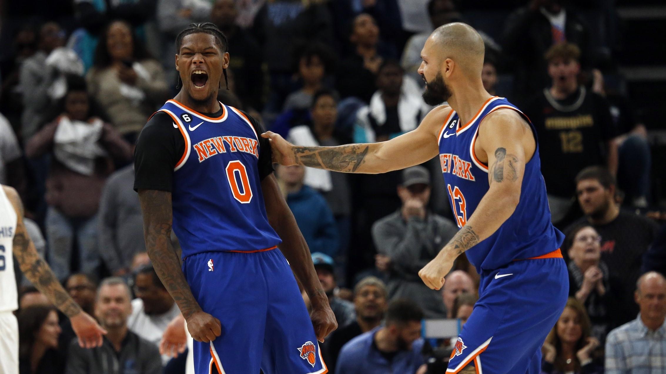 Oct 19, 2022; Memphis, Tennessee, USA; New York Knicks forward Cam Reddish (0) reacts with guard Evan Fournier (13) after making a three point basket with 3.3 seconds left in regulation against the Memphis Grizzlies at FedExForum. / Petre Thomas-USA TODAY Sports